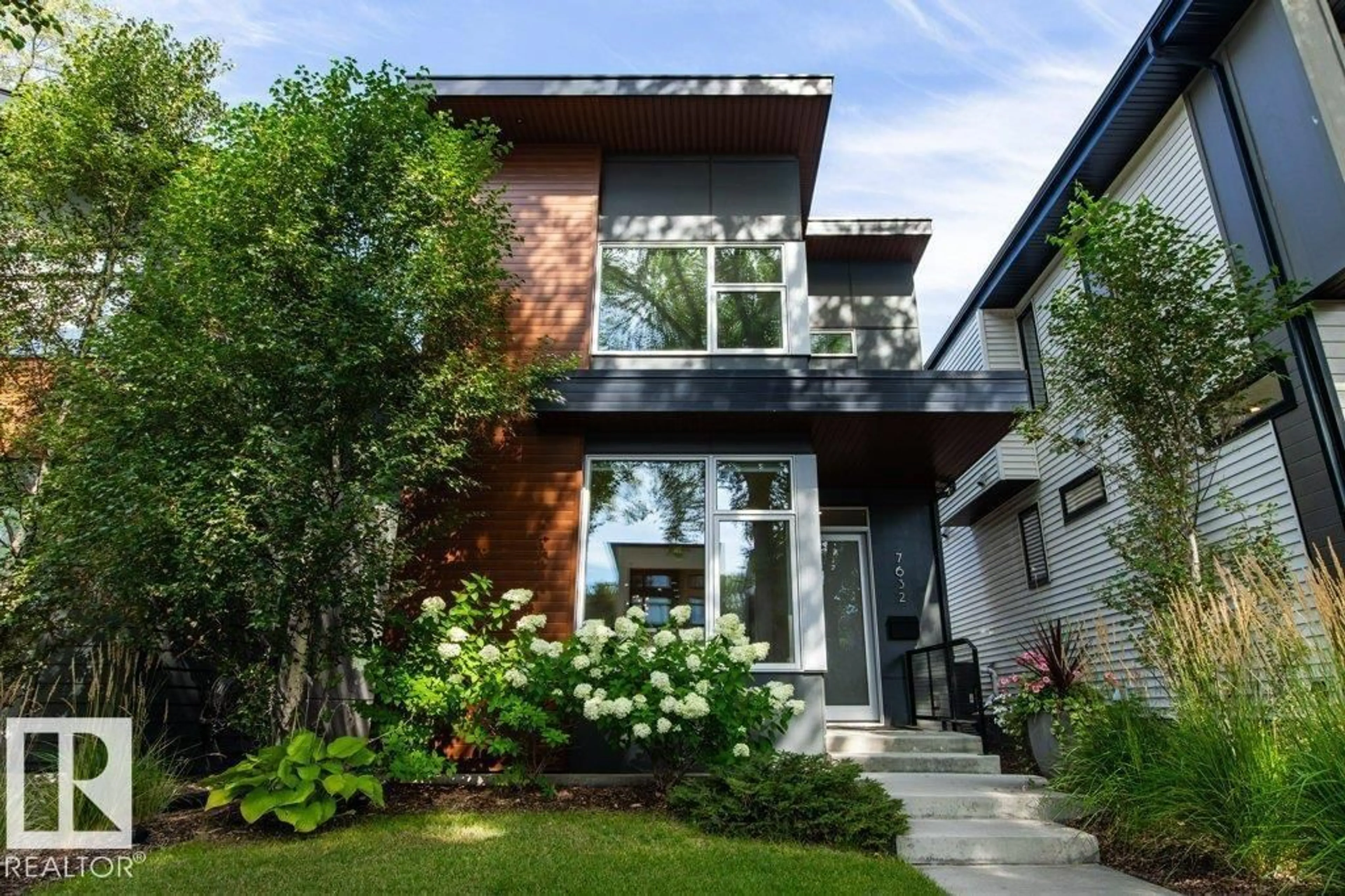 Home with brick exterior material, street for 7632 92 AV, Edmonton Alberta T6C1R4