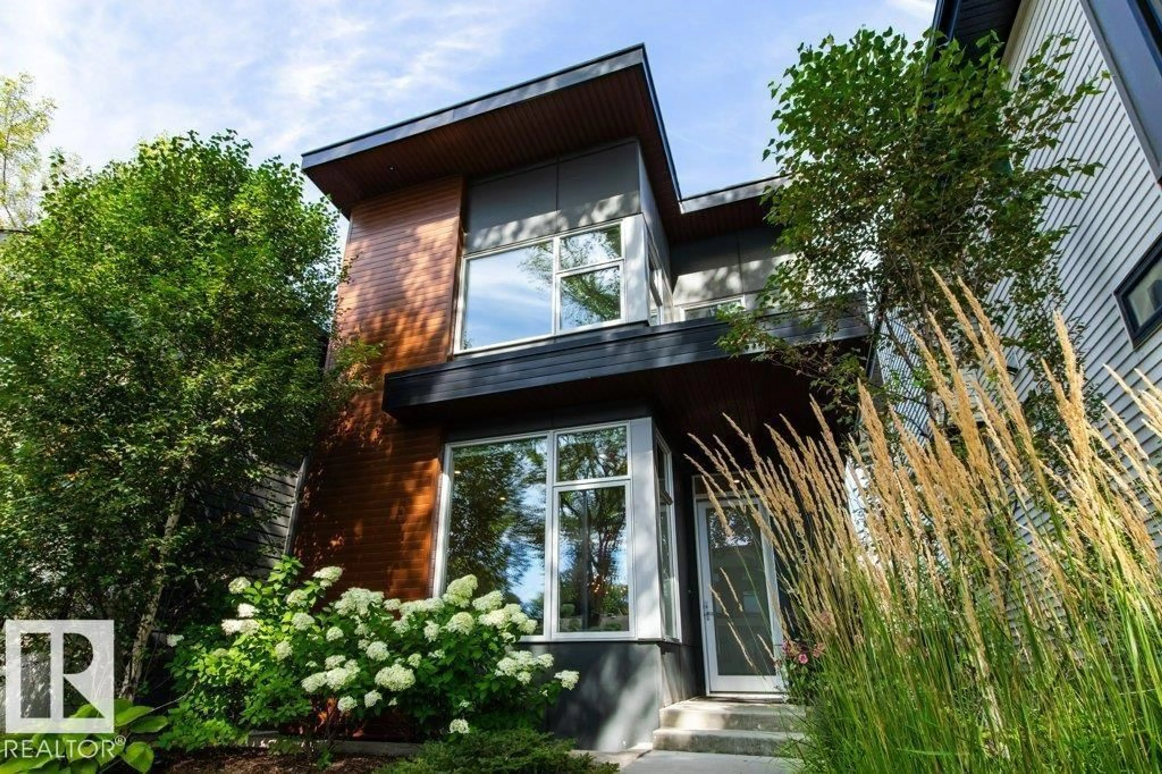 Home with brick exterior material, street for 7632 92 AV, Edmonton Alberta T6C1R4