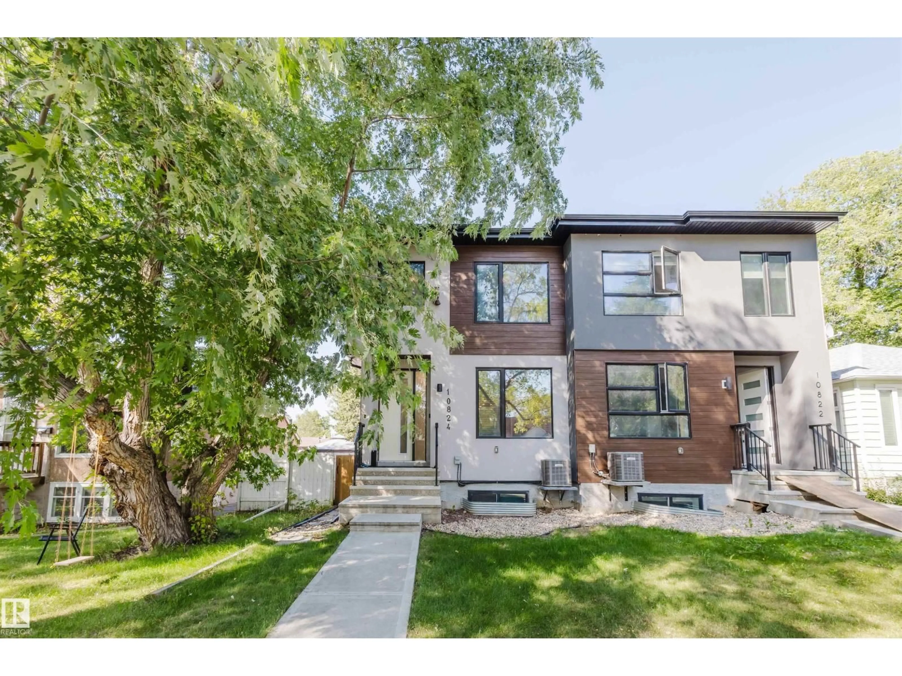 Home with brick exterior material, street for 10824 66 AV, Edmonton Alberta T6H1X9
