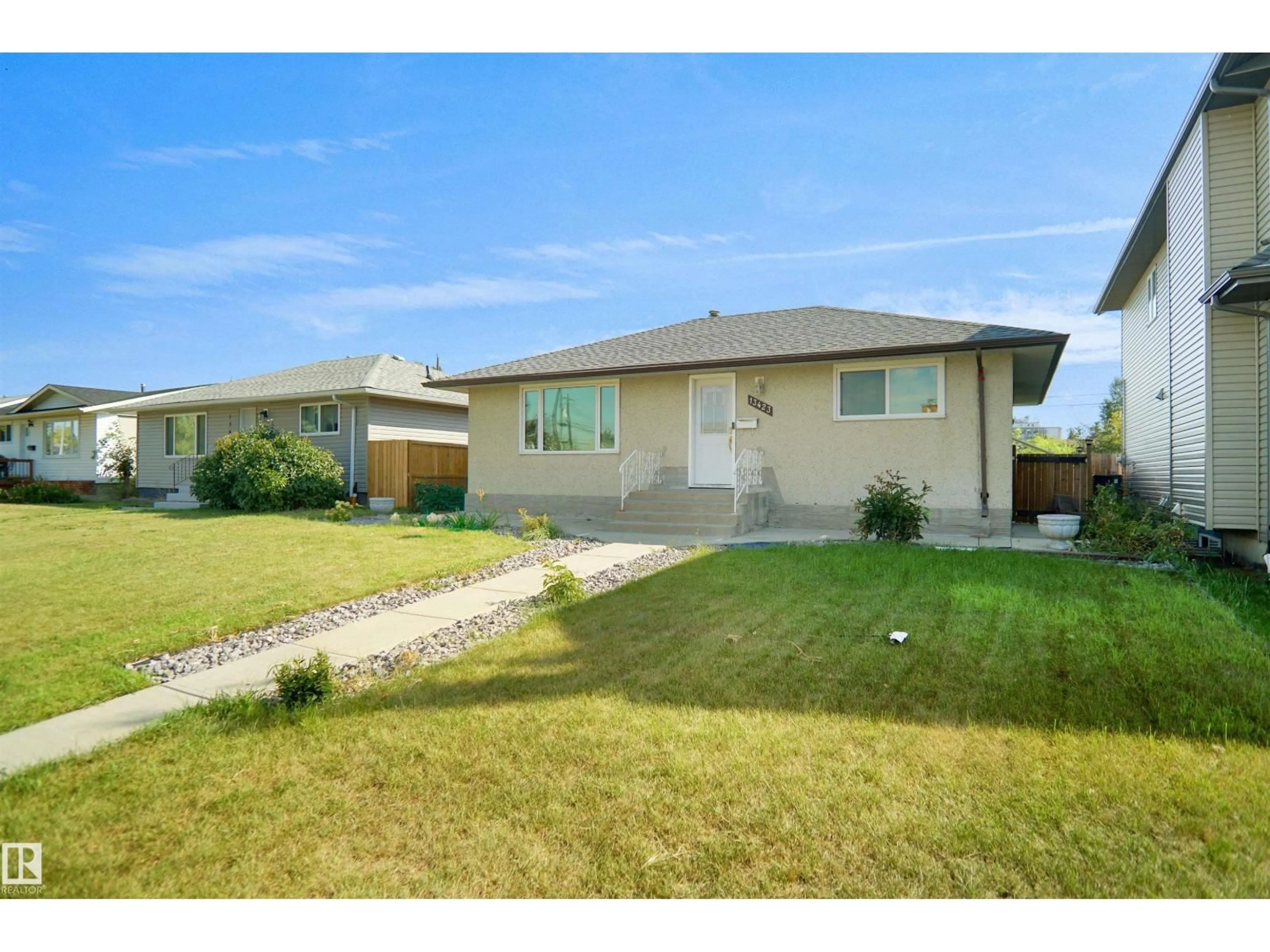 A pic from outside/outdoor area/front of a property/back of a property/a pic from drone, street for 13423 103 ST, Edmonton Alberta T5E4M7
