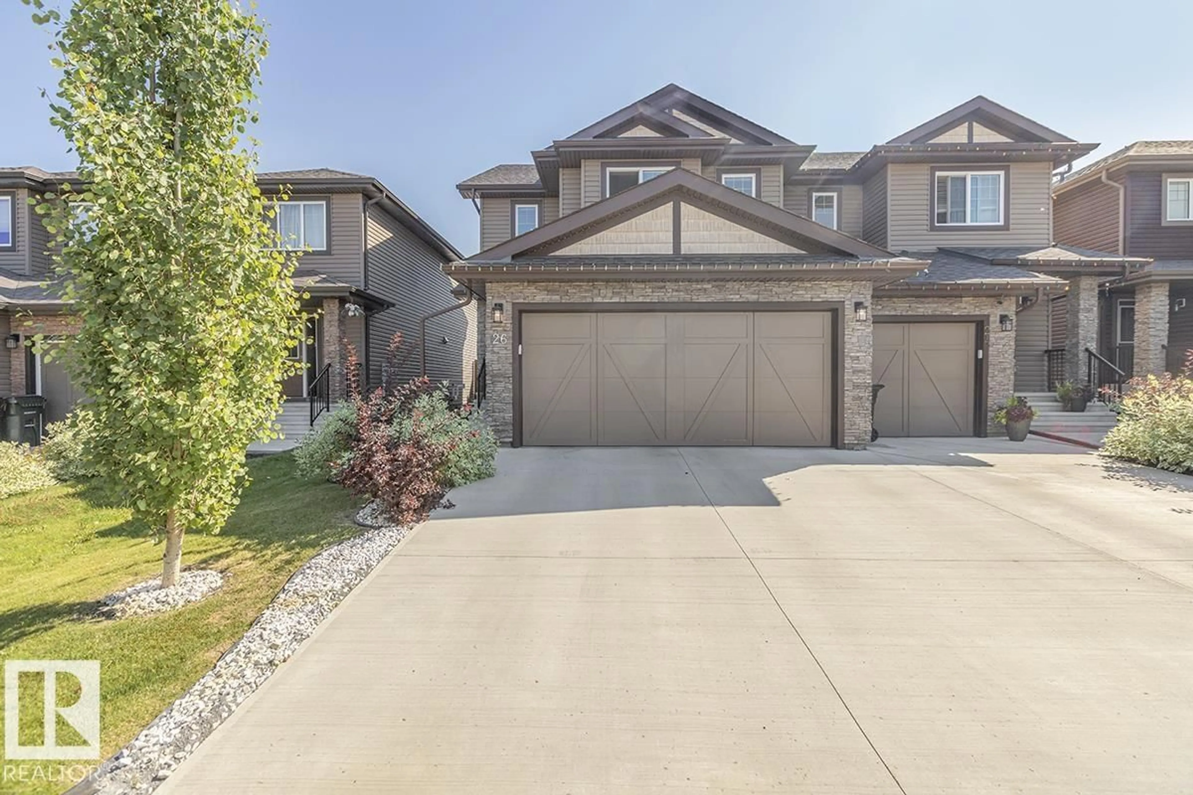 A pic from outside/outdoor area/front of a property/back of a property/a pic from drone, street for 26 PRAIRIE GA, Spruce Grove Alberta T7X0W8