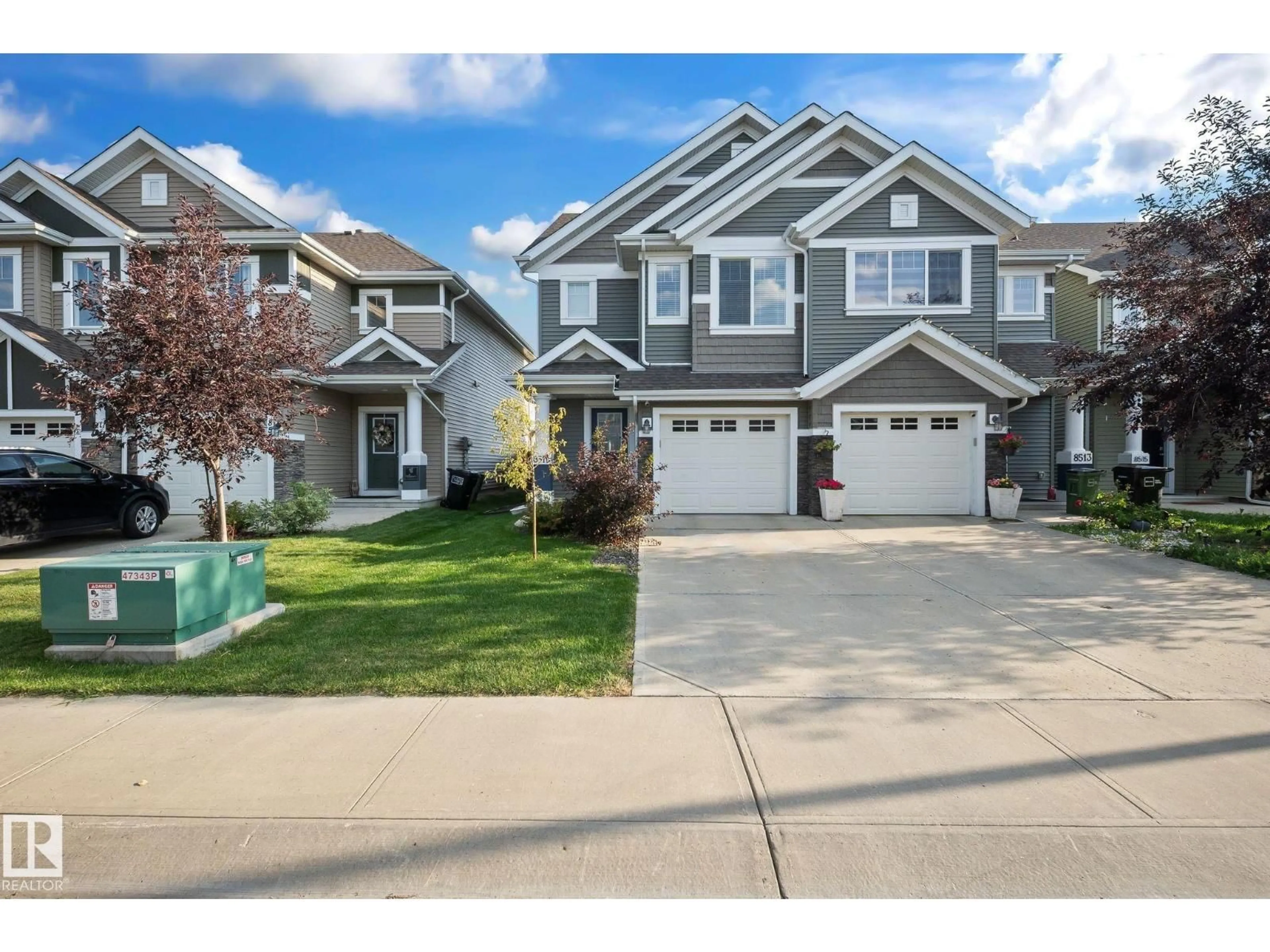 Home with vinyl exterior material, street for SW - 8511 24 AVE, Edmonton Alberta T6X2G3