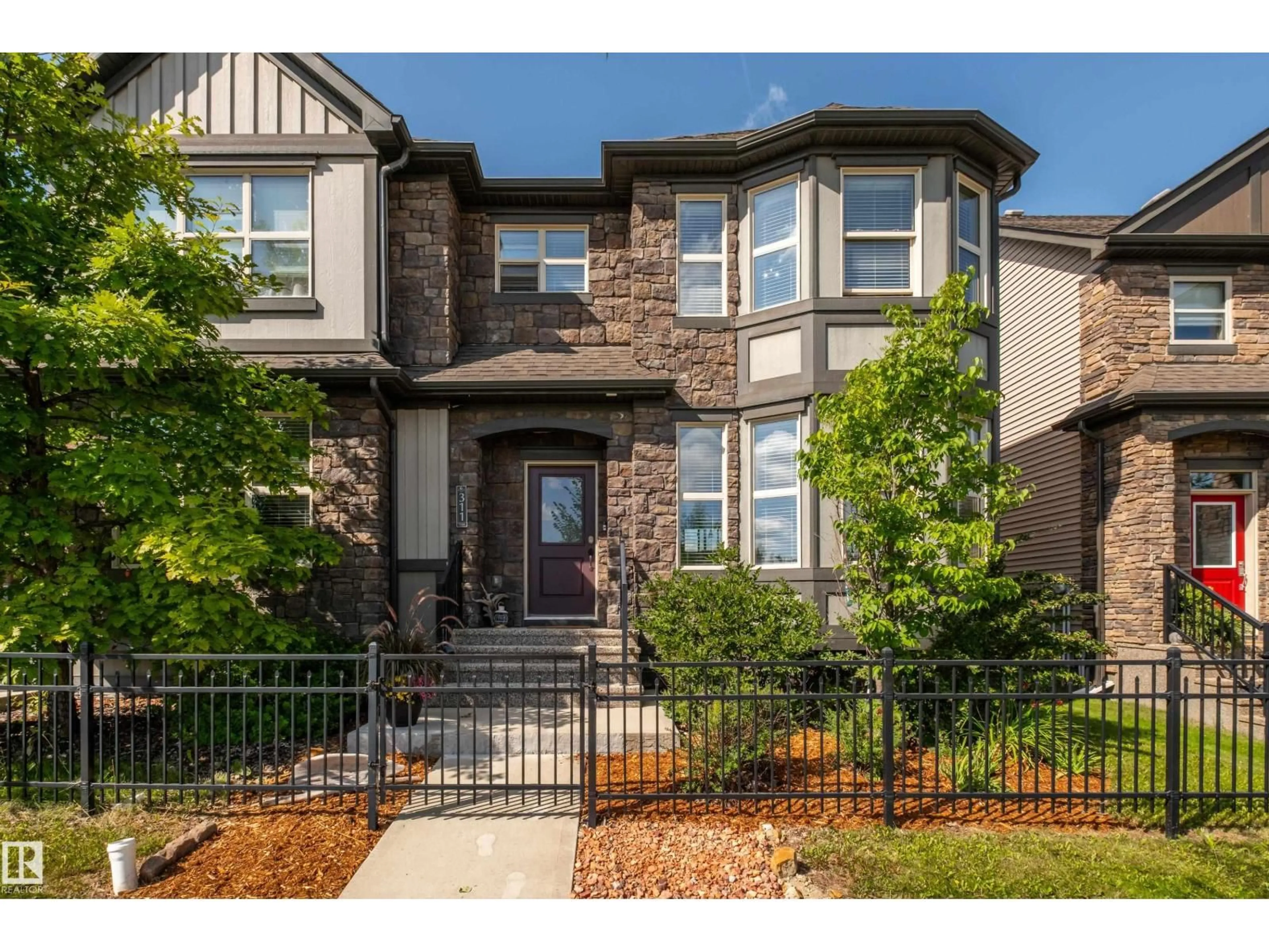 Home with brick exterior material, street for 311 PIONEER RD, Spruce Grove Alberta T7X0T1