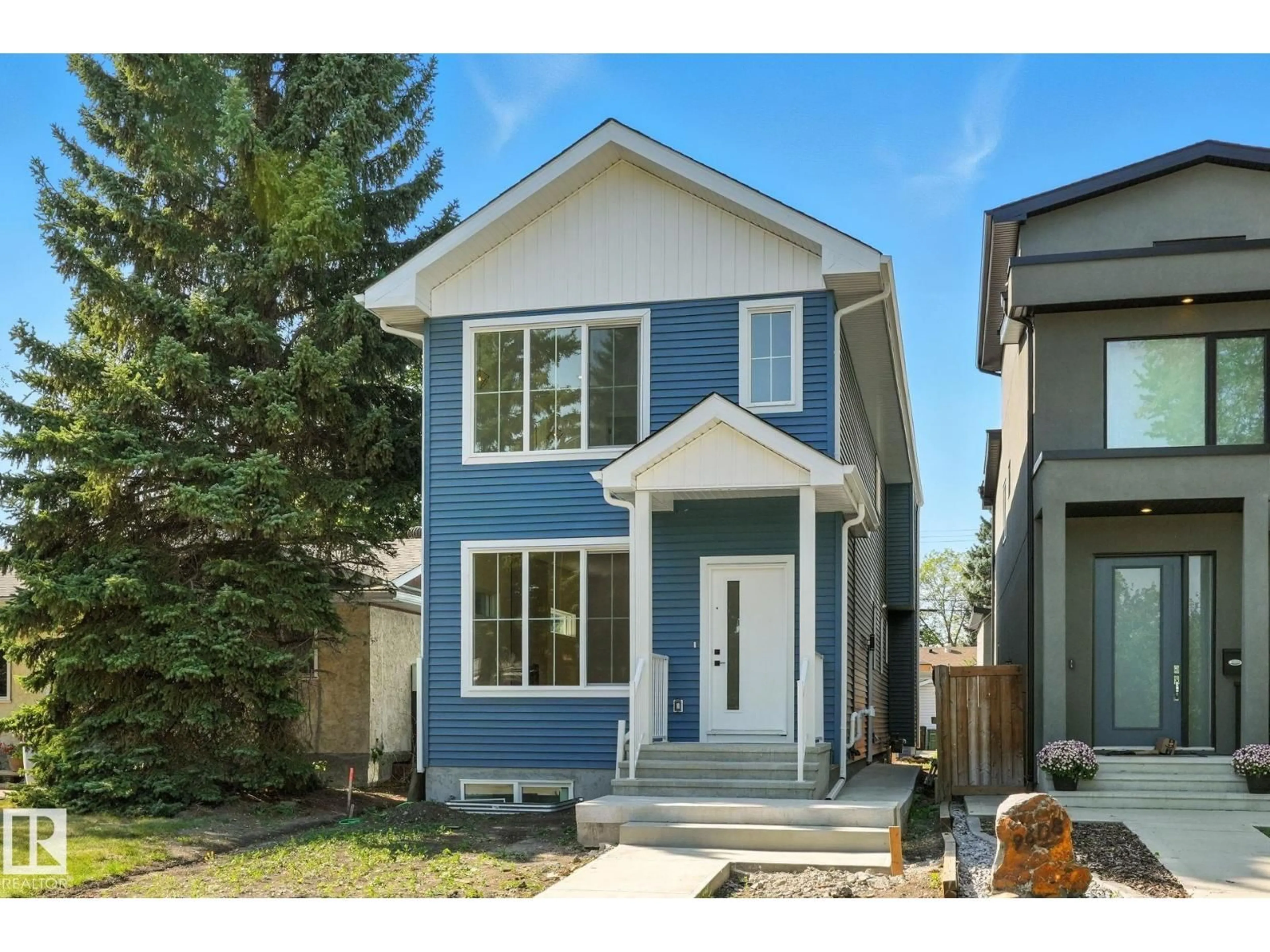 Home with vinyl exterior material, street for 9606 86 STREET NW, Edmonton Alberta T6C3E9