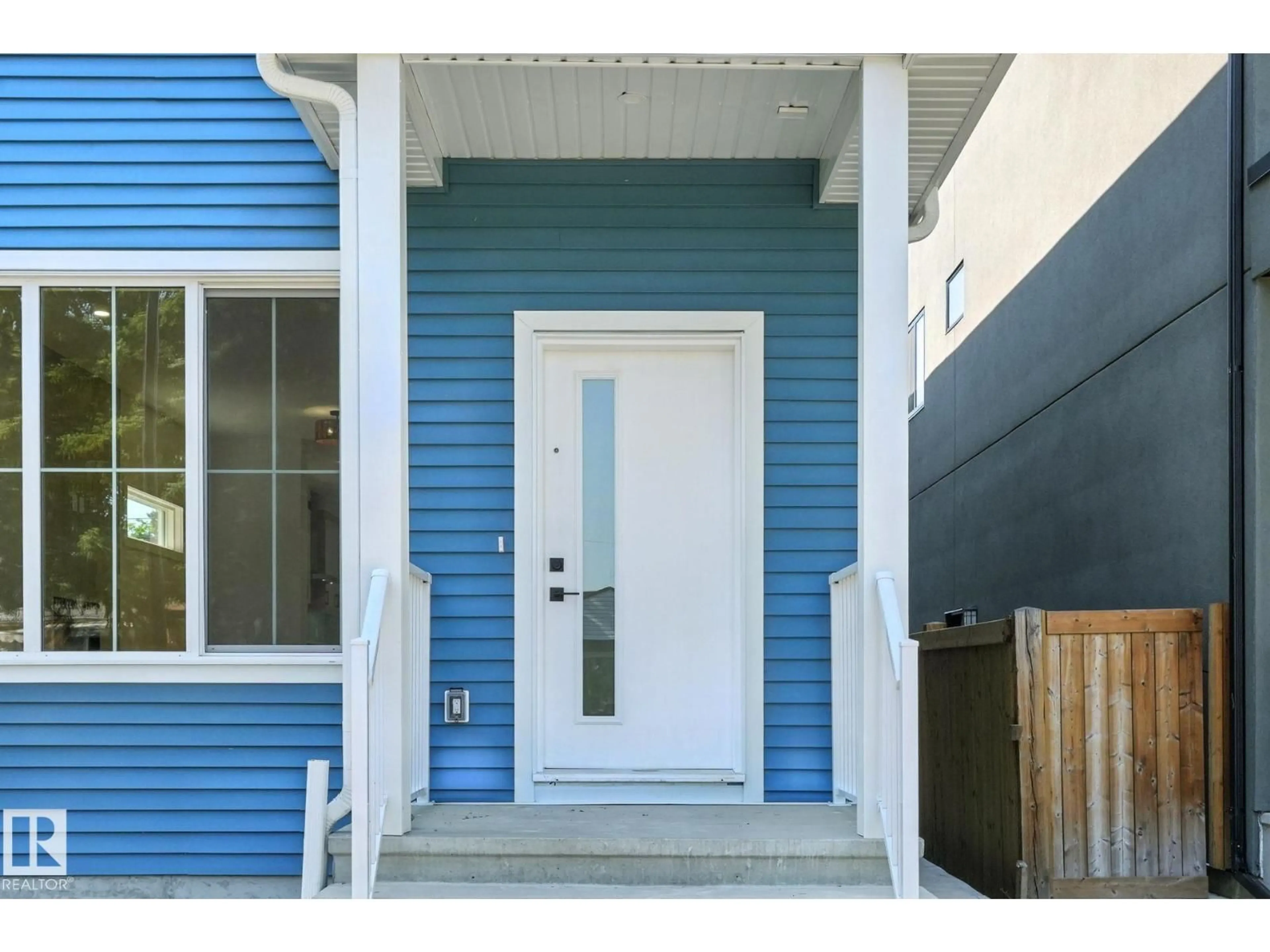 Home with vinyl exterior material, street for 9606 86 STREET NW, Edmonton Alberta T6C3E9