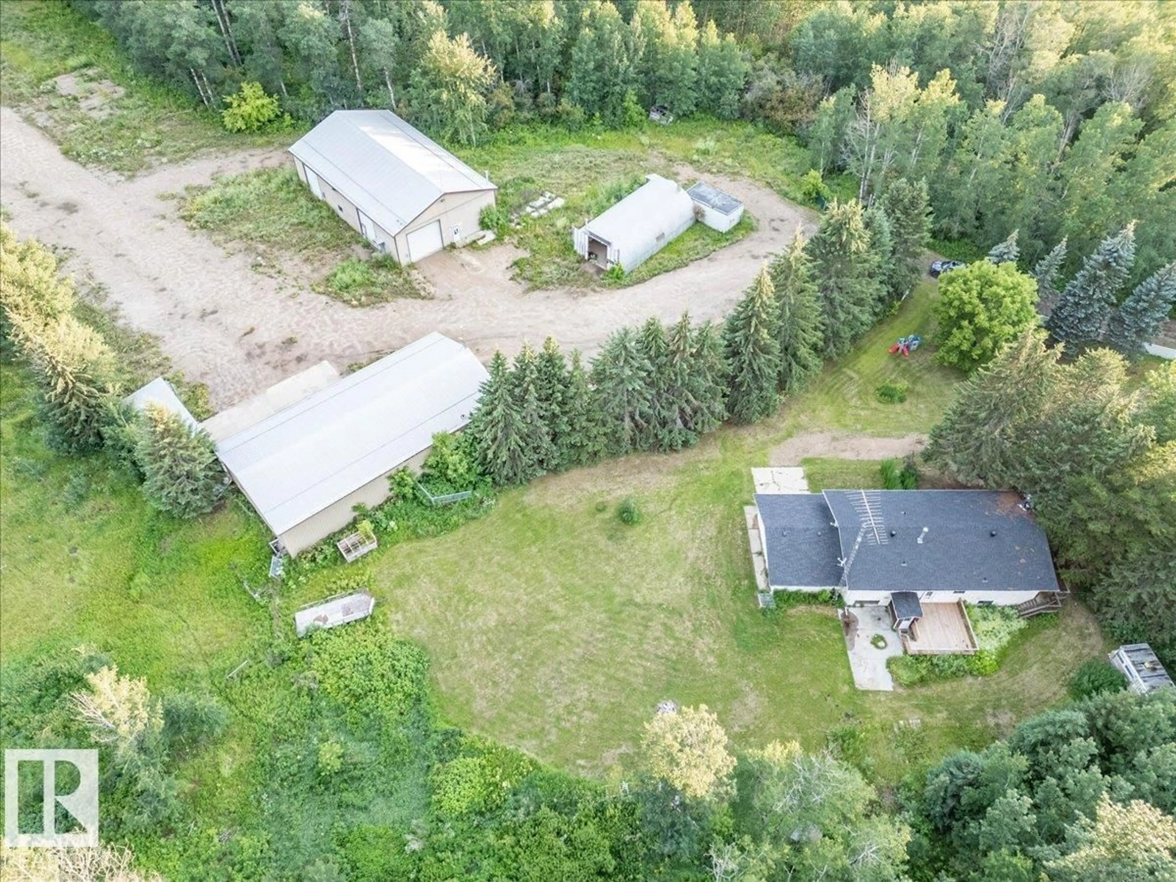 A pic from outside/outdoor area/front of a property/back of a property/a pic from drone, unknown for A - 2047 TWP ROAD 495, Rural Leduc County Alberta T0C2P0