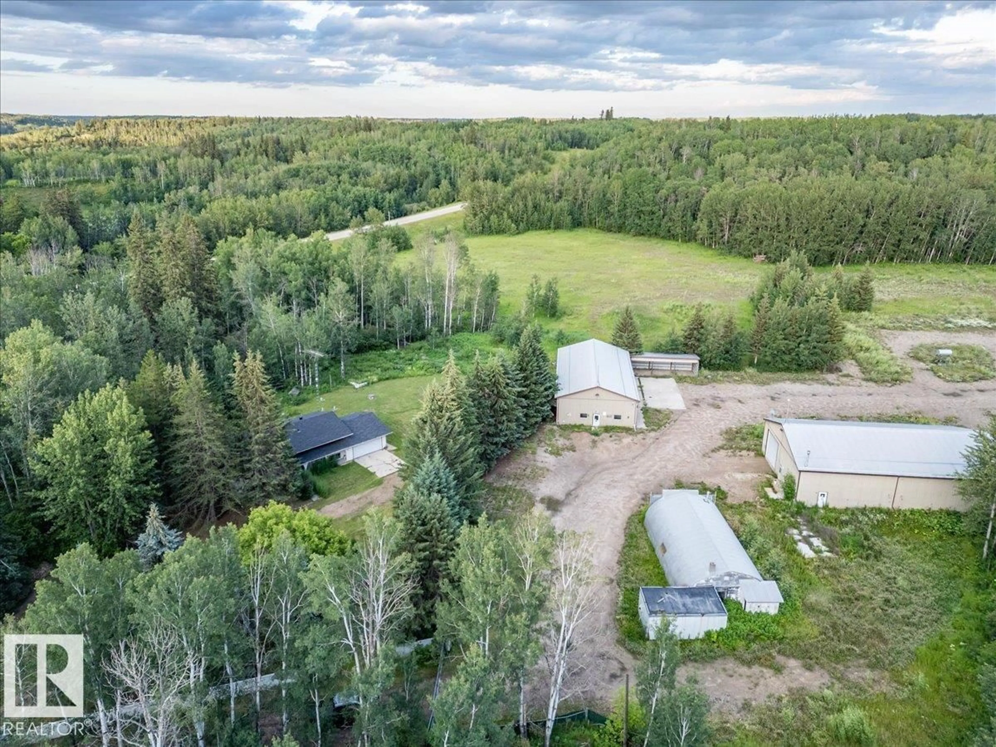 A pic from outside/outdoor area/front of a property/back of a property/a pic from drone, forest/trees view for A - 2047 TWP ROAD 495, Rural Leduc County Alberta T0C2P0