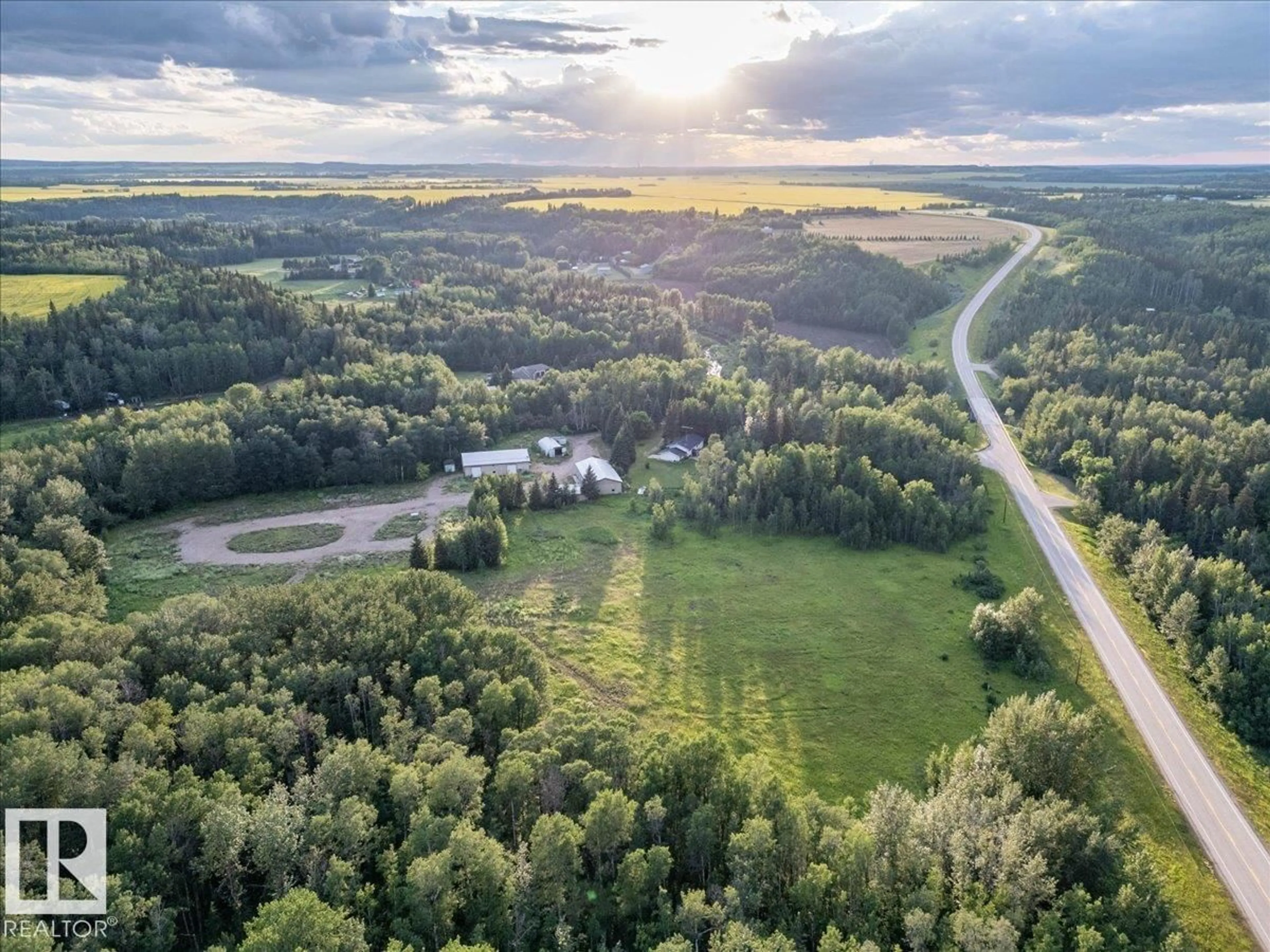 A pic from outside/outdoor area/front of a property/back of a property/a pic from drone, forest/trees view for A - 2047 TWP ROAD 495, Rural Leduc County Alberta T0C2P0