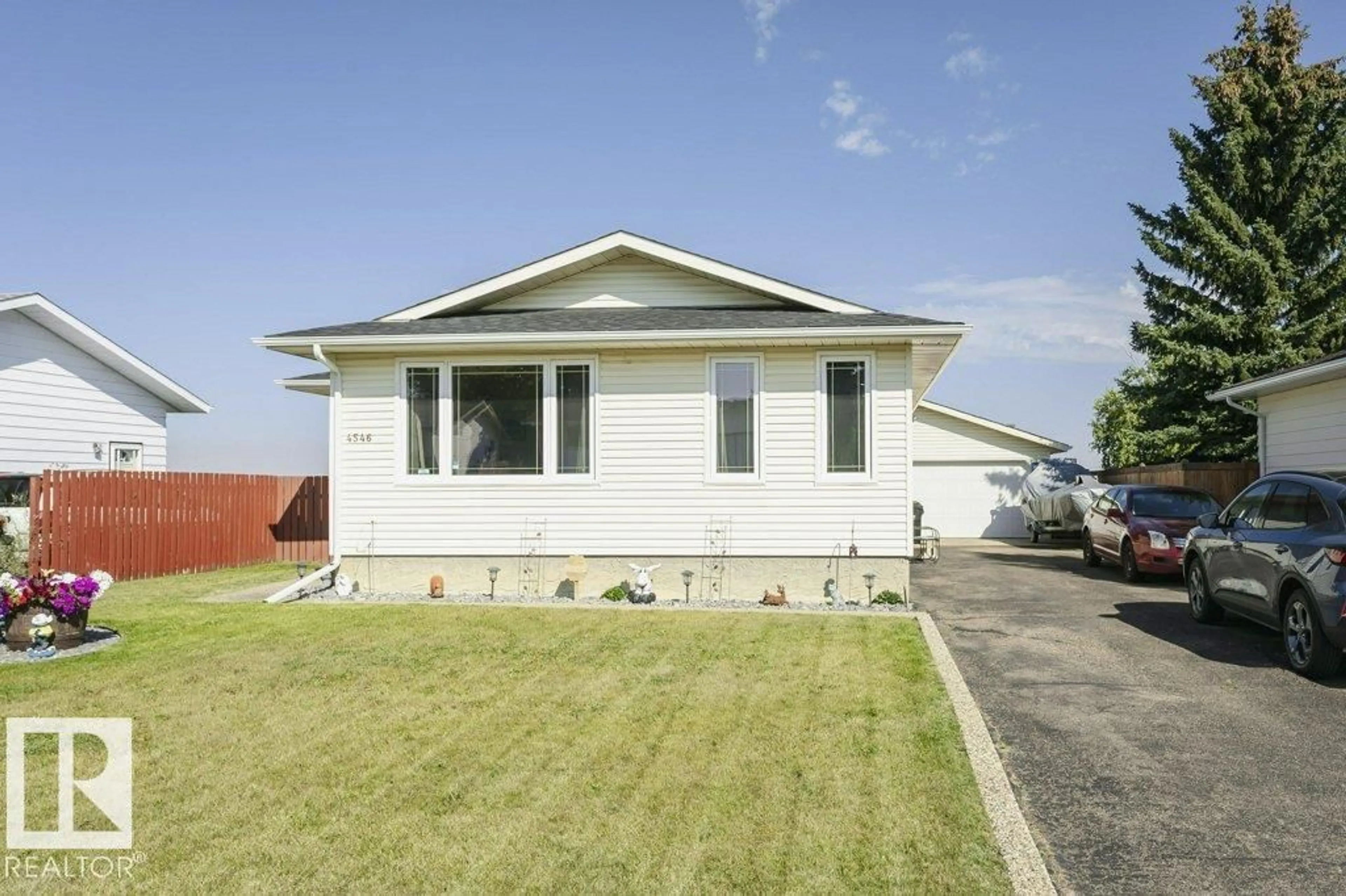 Home with vinyl exterior material, street for 4546 56 AV, Bruderheim Alberta T0B2R0