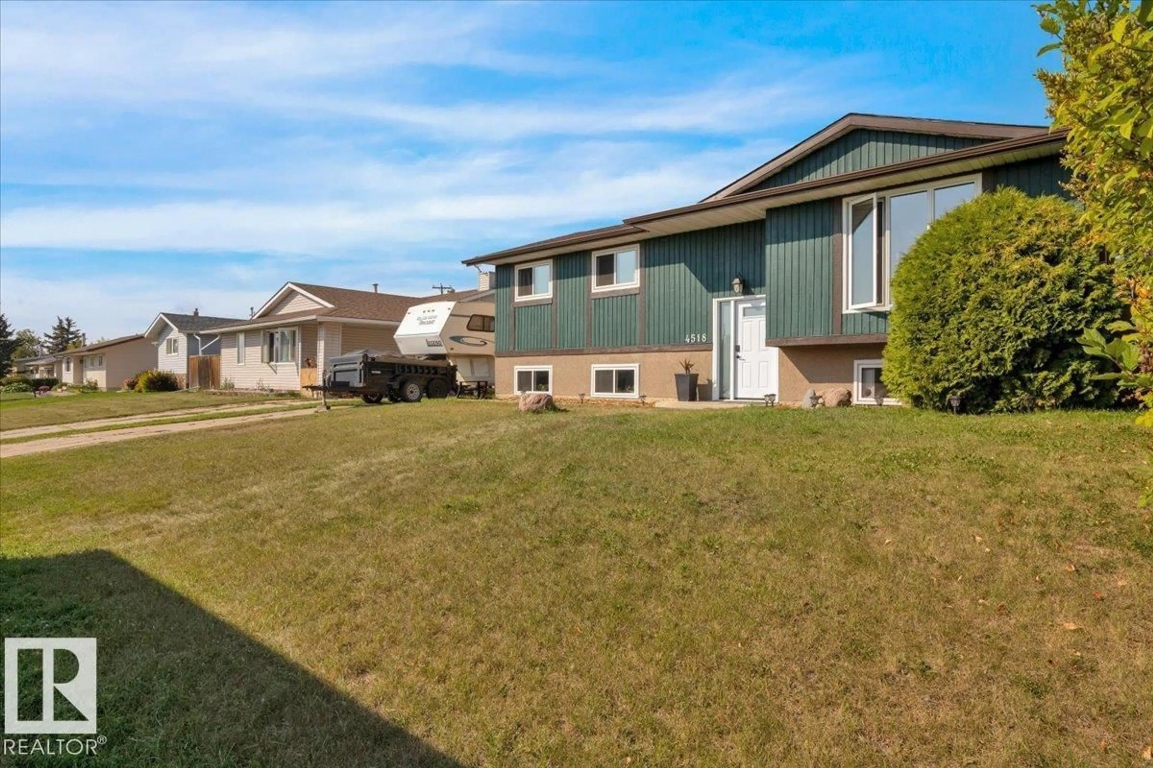 A pic from outside/outdoor area/front of a property/back of a property/a pic from drone, unknown for 4518 48 AV, Gibbons Alberta T0A1N0