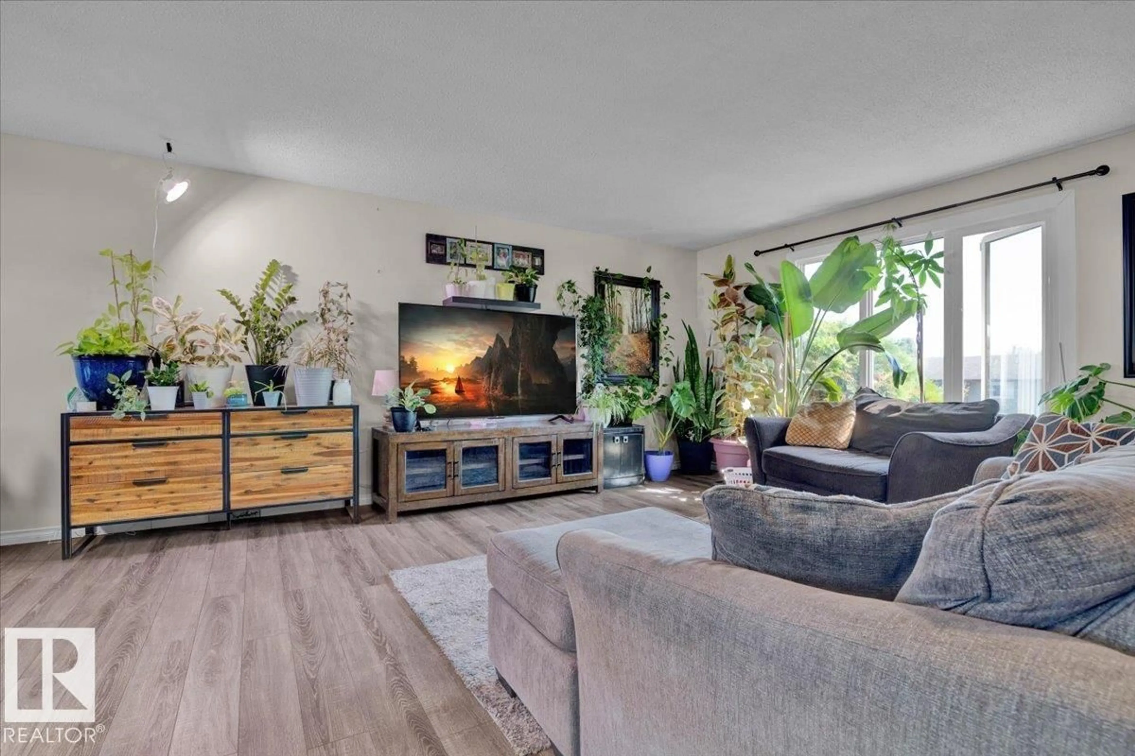 Living room with furniture, unknown for 4518 48 AV, Gibbons Alberta T0A1N0