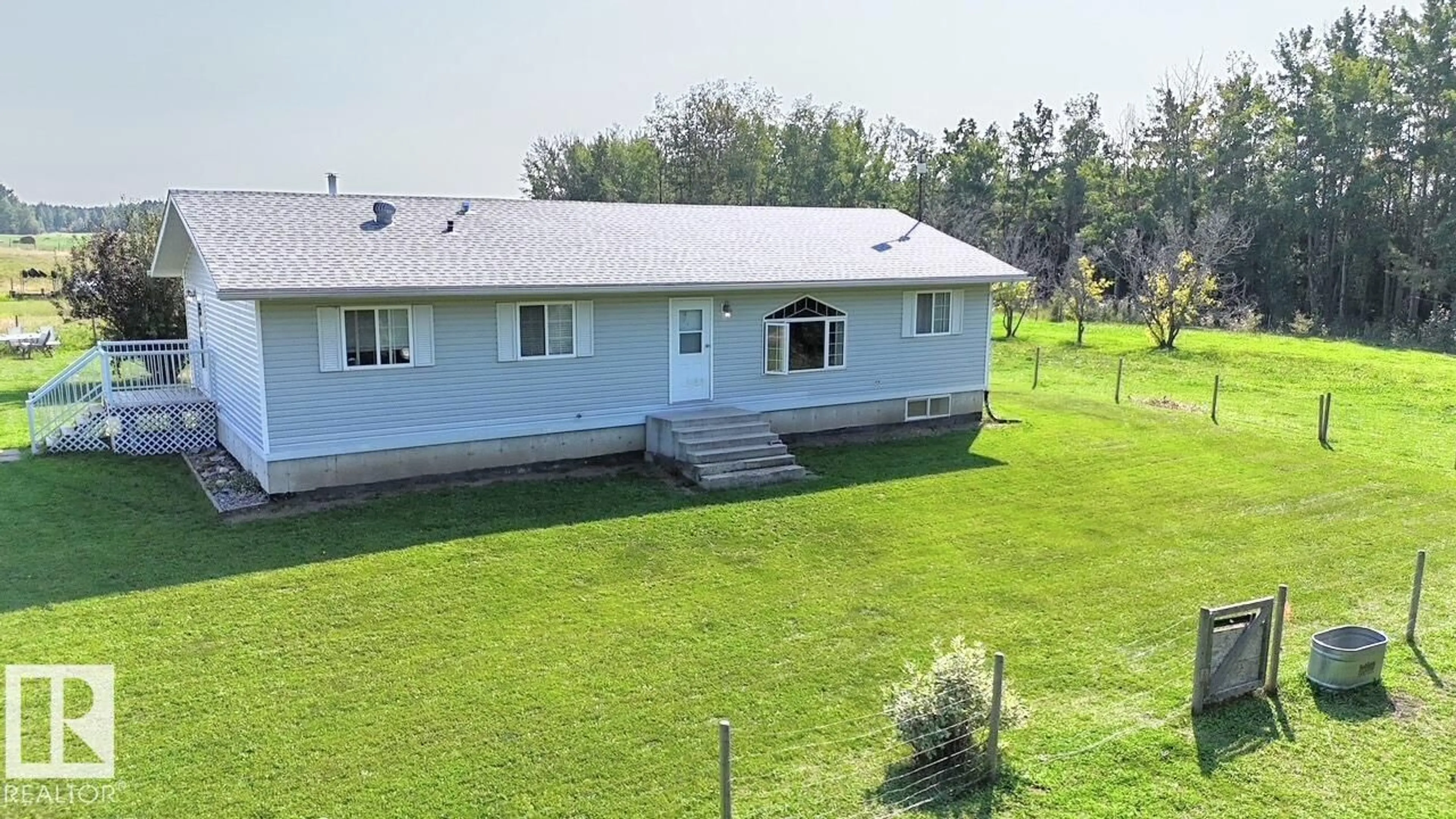 A pic from outside/outdoor area/front of a property/back of a property/a pic from drone, unknown for 51015 RR 70, Rural Parkland County Alberta T0E2H0