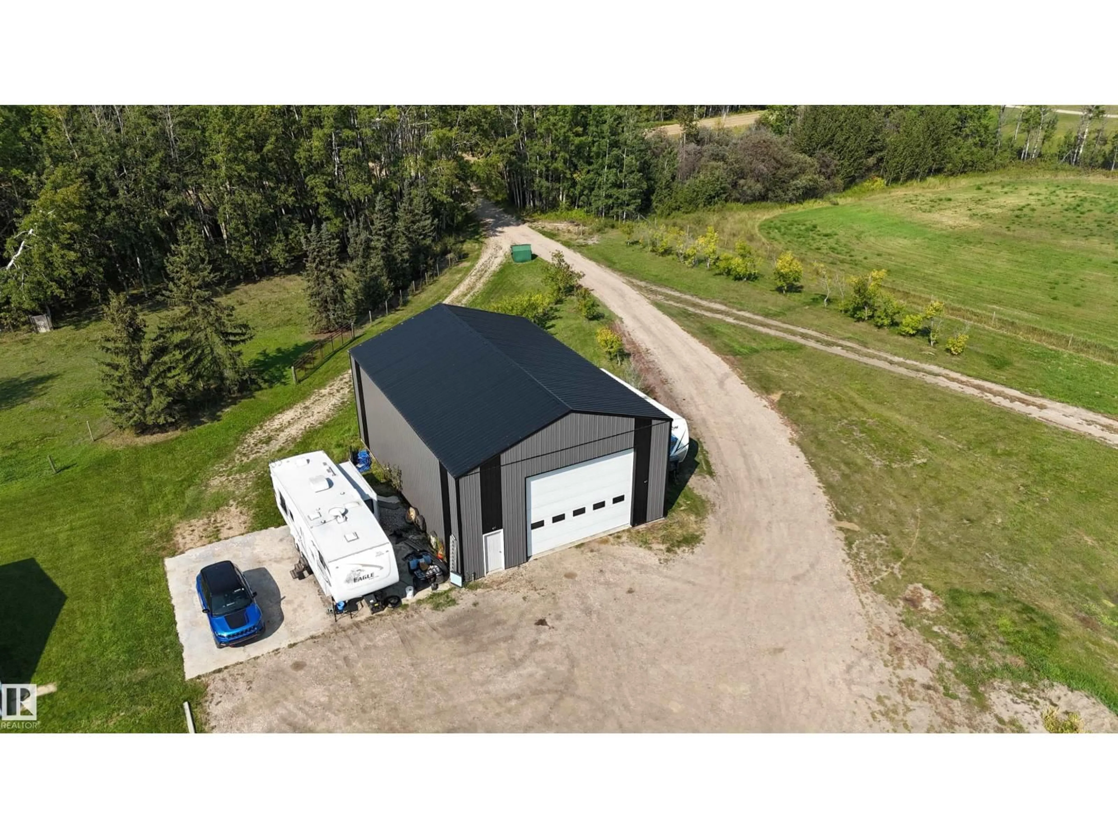 A pic from outside/outdoor area/front of a property/back of a property/a pic from drone, building for 51015 RR 70, Rural Parkland County Alberta T0E2H0