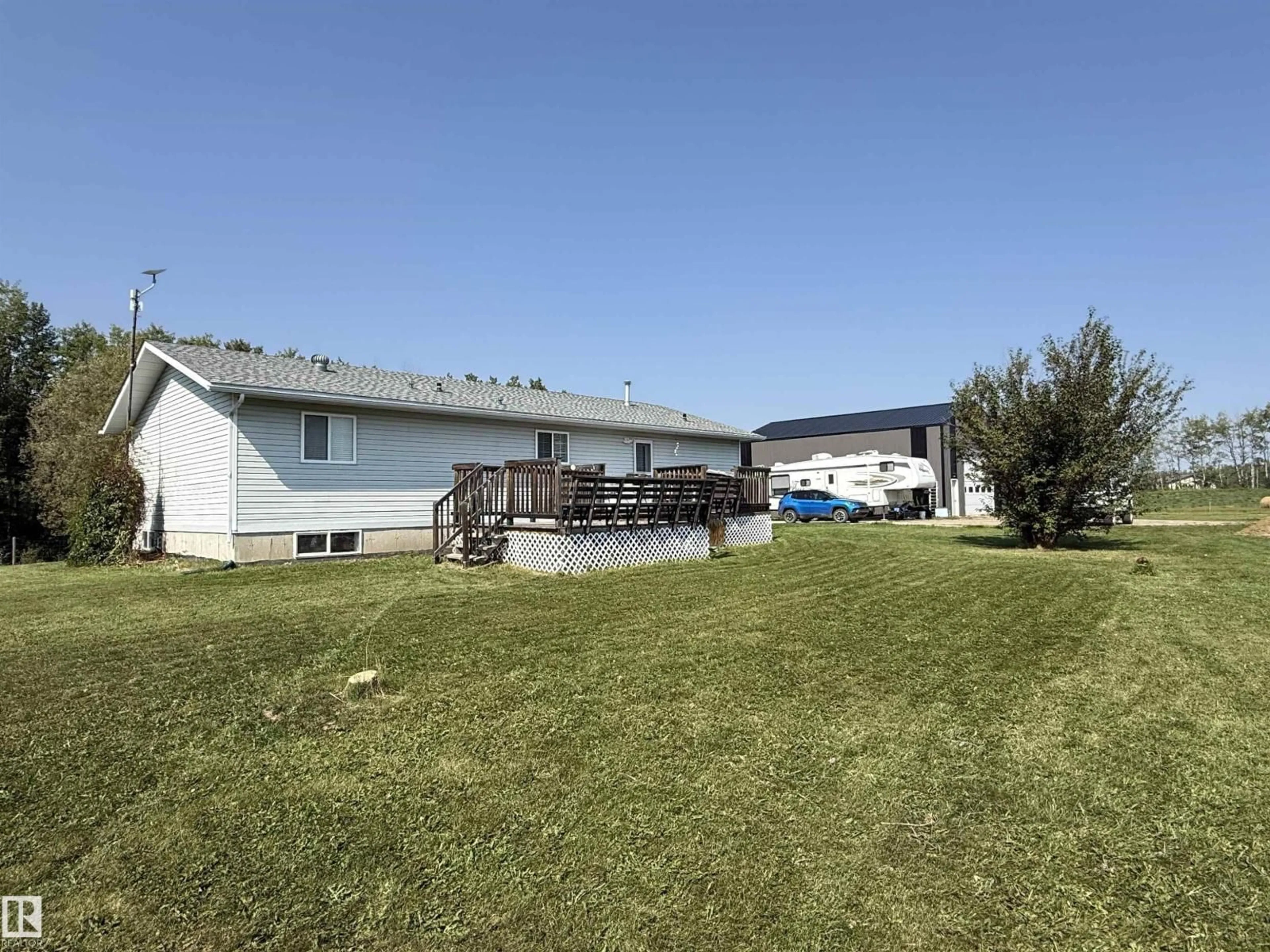 A pic from outside/outdoor area/front of a property/back of a property/a pic from drone, water/lake/river/ocean view for 51015 RR 70, Rural Parkland County Alberta T0E2H0