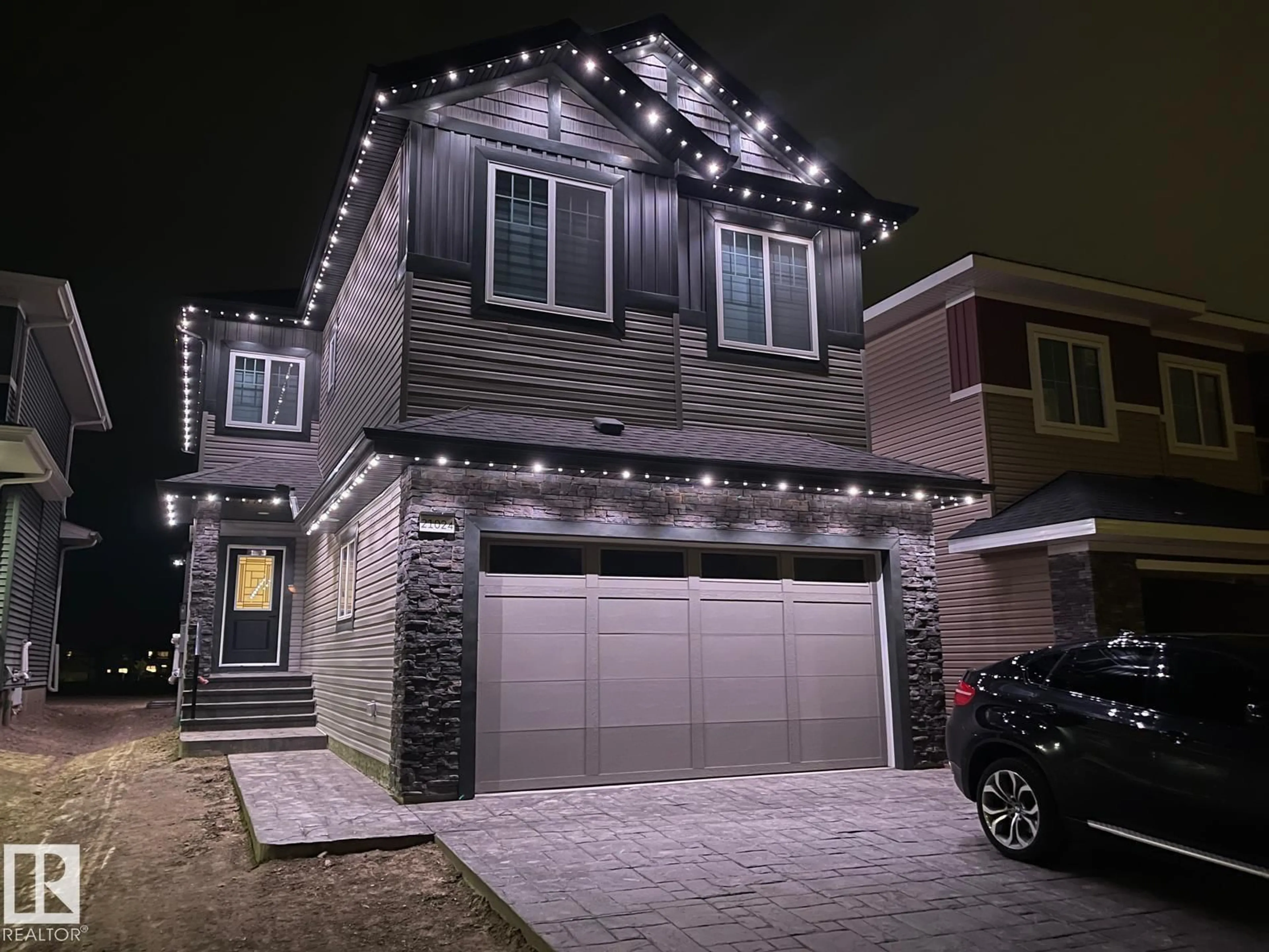Home with vinyl exterior material, street for 21024 128 AV, Edmonton Alberta T5V1C0