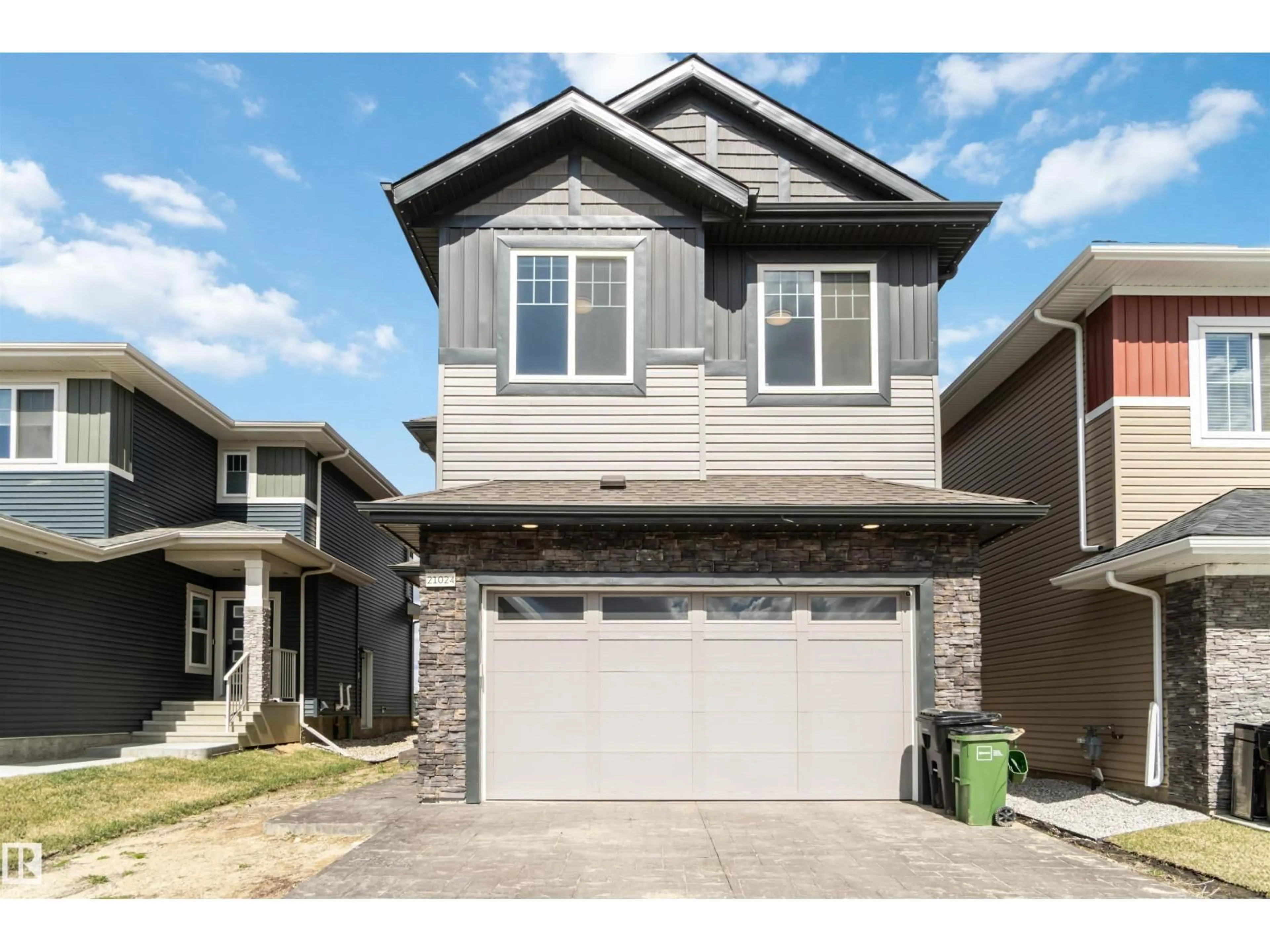 Home with vinyl exterior material, street for 21024 128 AV, Edmonton Alberta T5V1C0