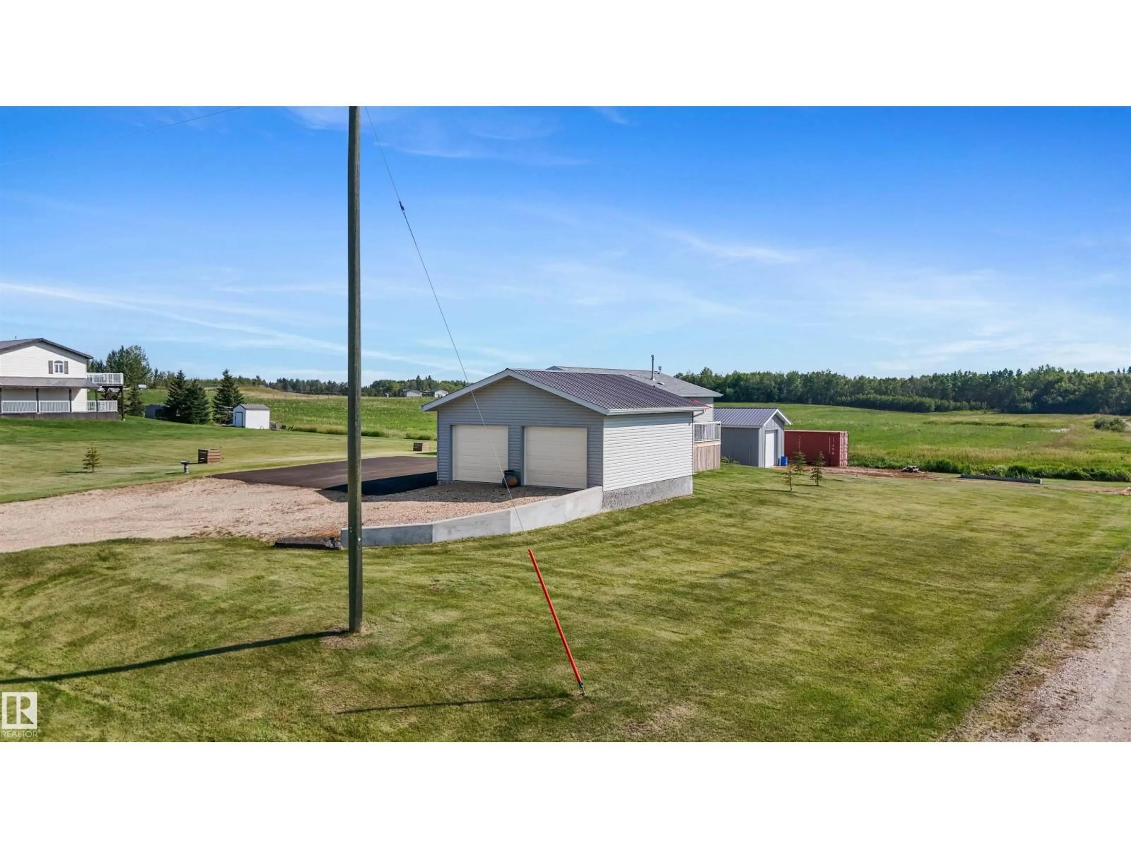A pic from outside/outdoor area/front of a property/back of a property/a pic from drone, building for 5049 50A AV, Rural Brazeau County Alberta T0C1W0