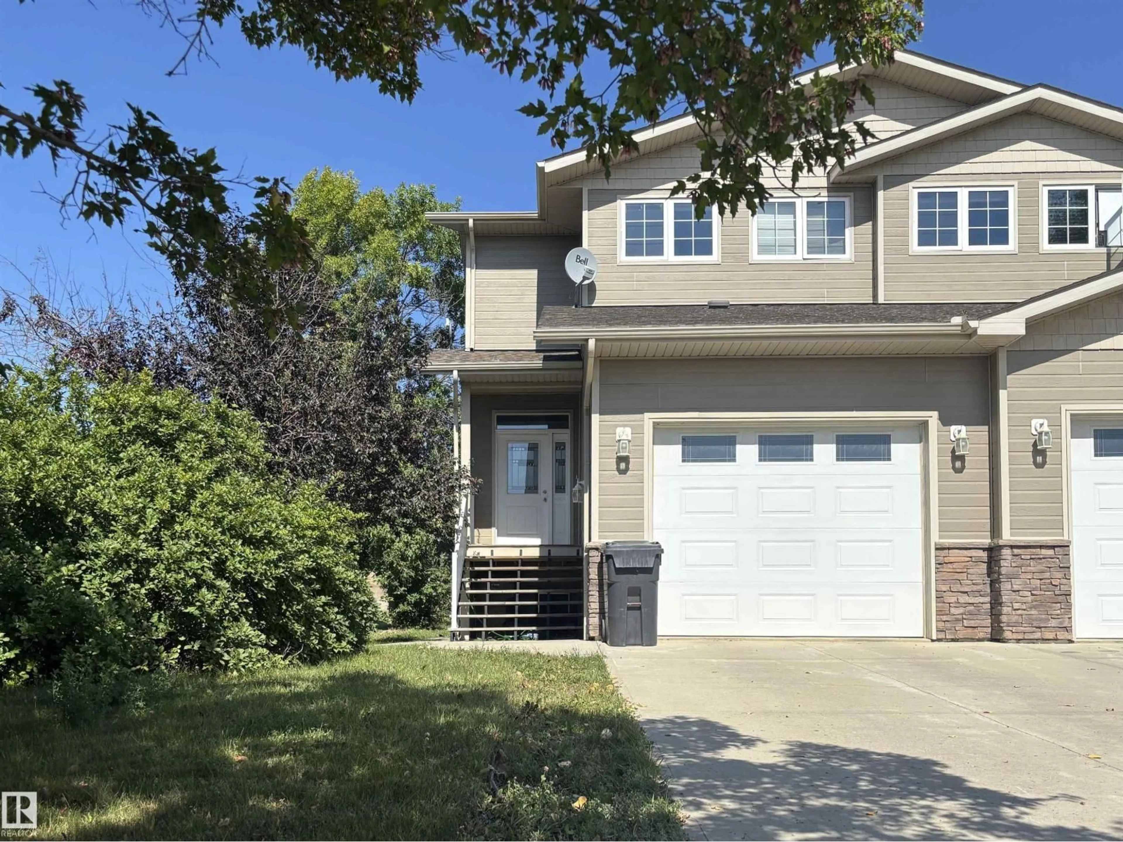 Home with vinyl exterior material, street for 4804 53 AV, Elk Point Alberta T0A1A0
