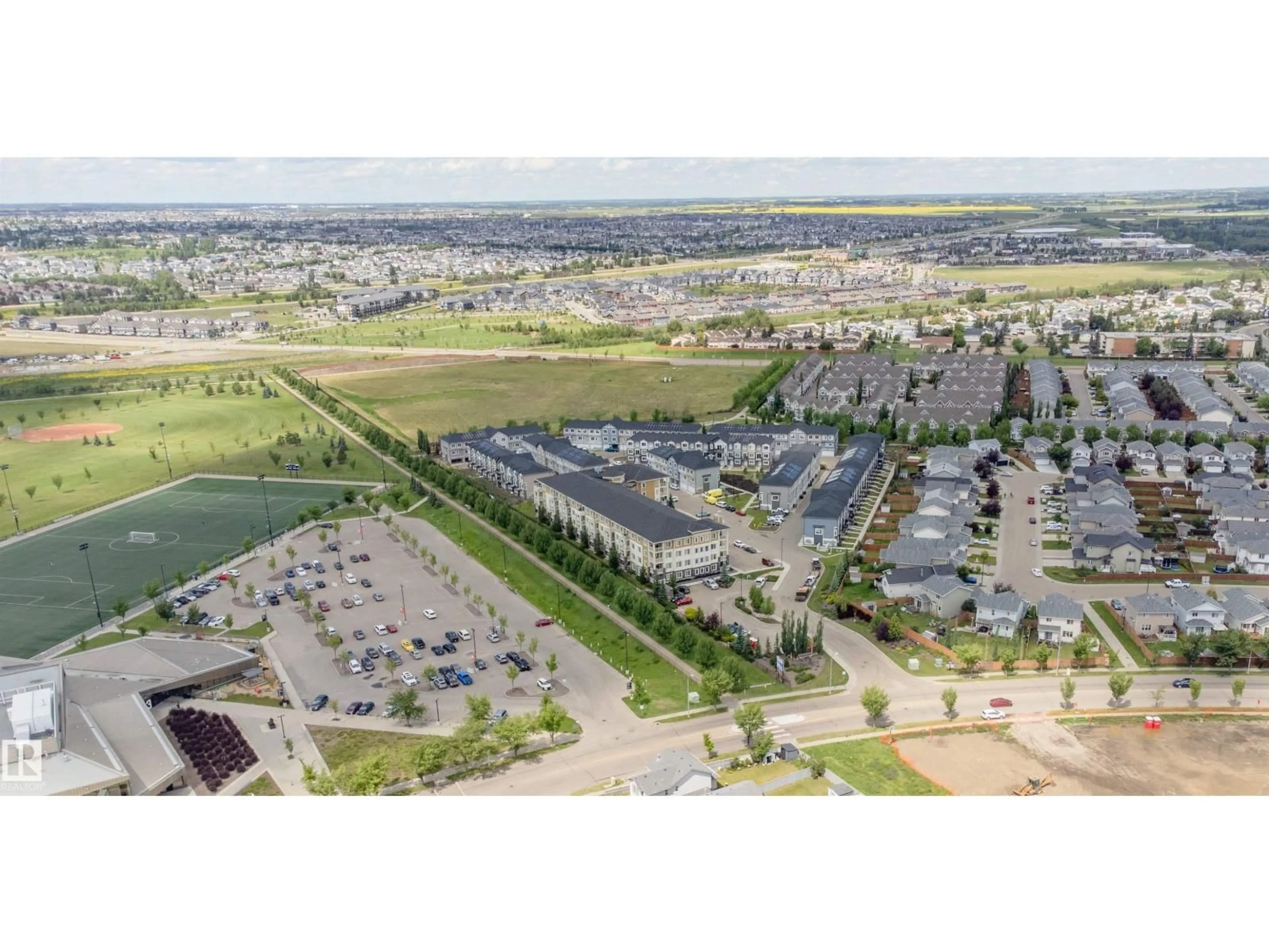 A pic from outside/outdoor area/front of a property/back of a property/a pic from drone, unknown for 207 - 3670 139 AV, Edmonton Alberta T5Y2N5