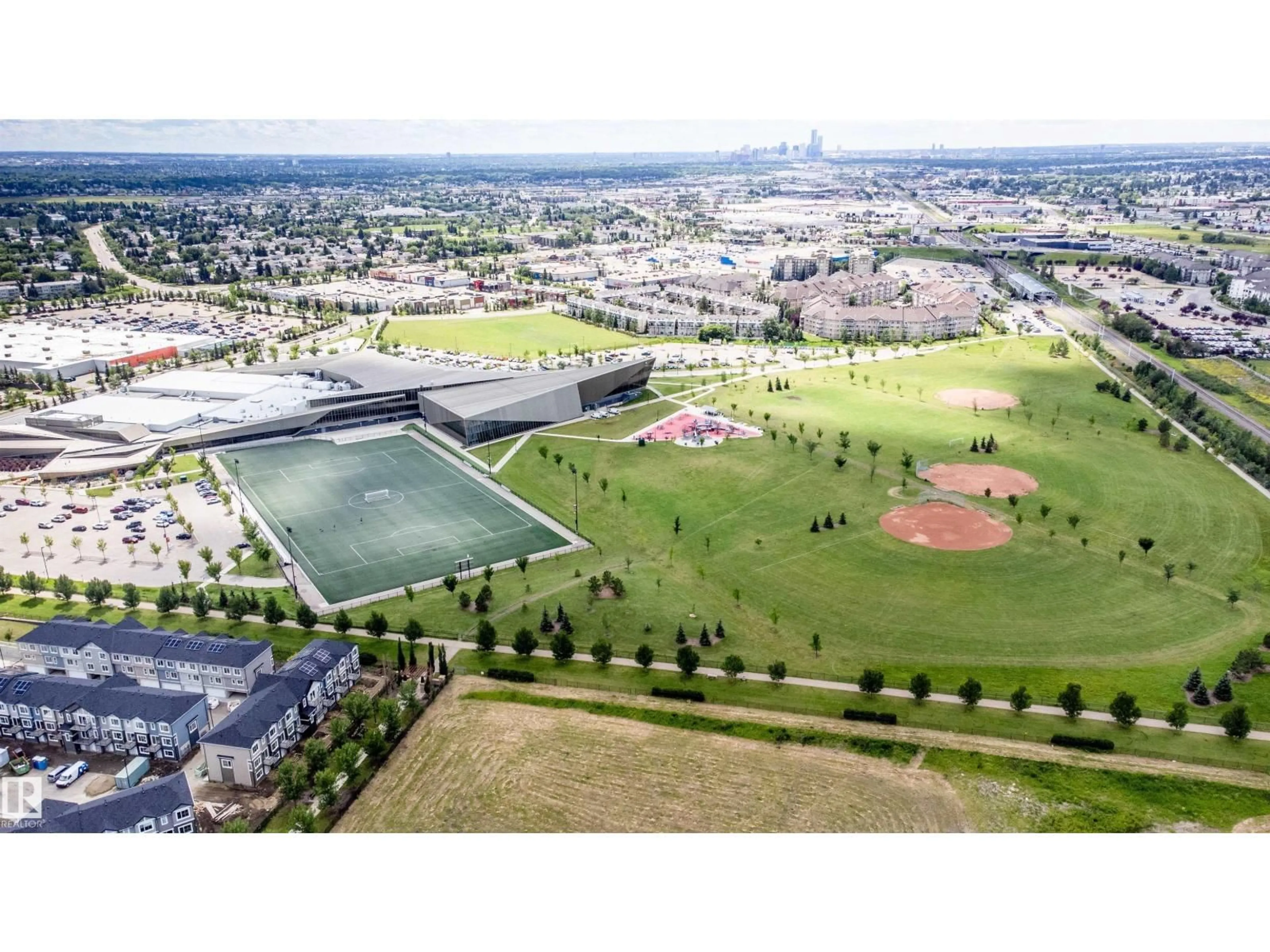 A pic from outside/outdoor area/front of a property/back of a property/a pic from drone, mountain view for 207 - 3670 139 AV, Edmonton Alberta T5Y2N5