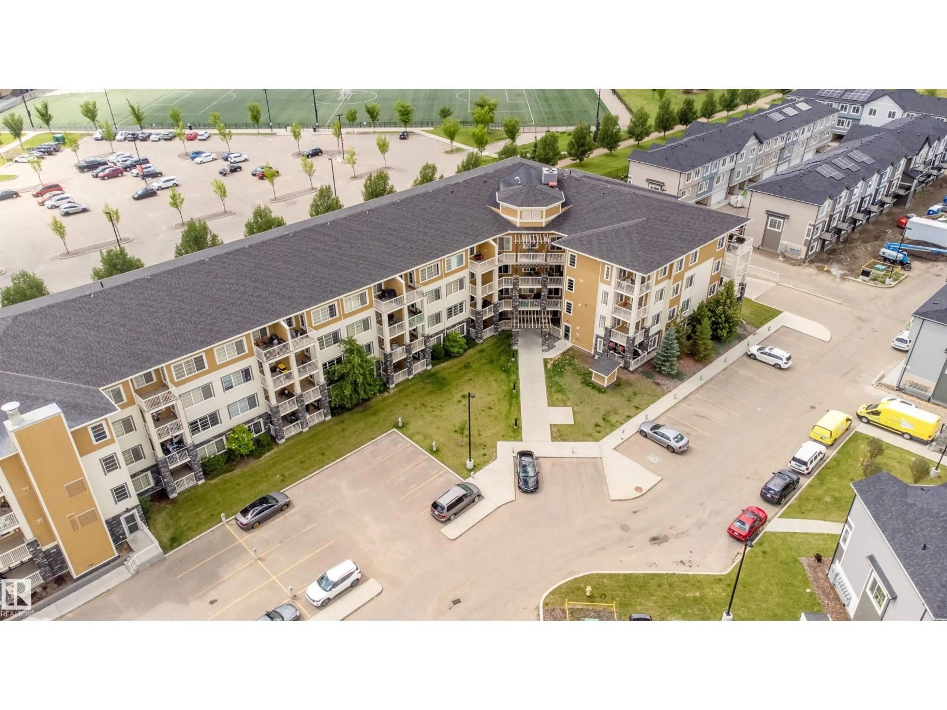 A pic from outside/outdoor area/front of a property/back of a property/a pic from drone, building for 207 - 3670 139 AV, Edmonton Alberta T5Y2N5
