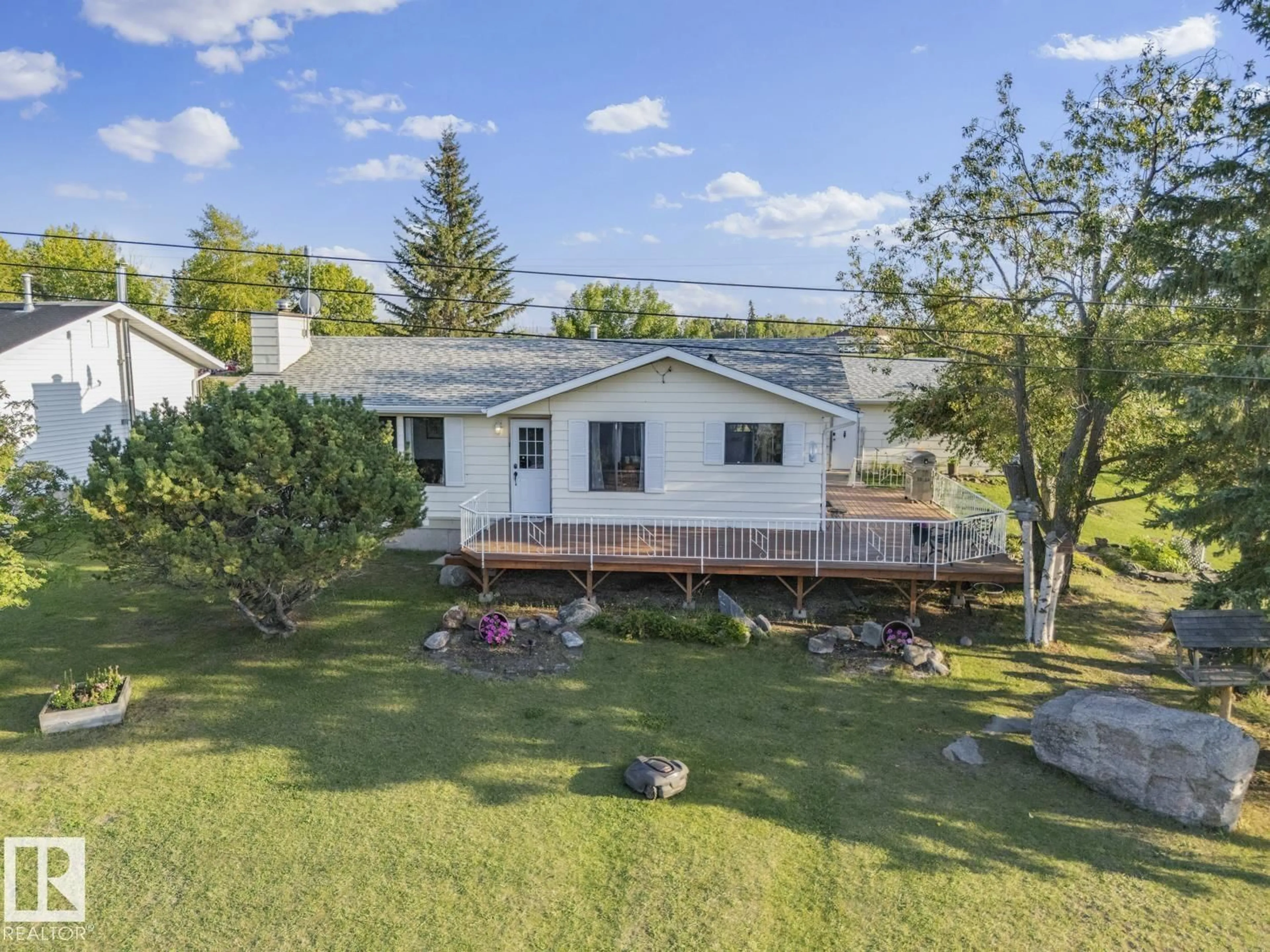 A pic from outside/outdoor area/front of a property/back of a property/a pic from drone, mountain view for 25 - 25 TWP RD 611 RD, Rural Bonnyville M.D. Alberta T9N2J6