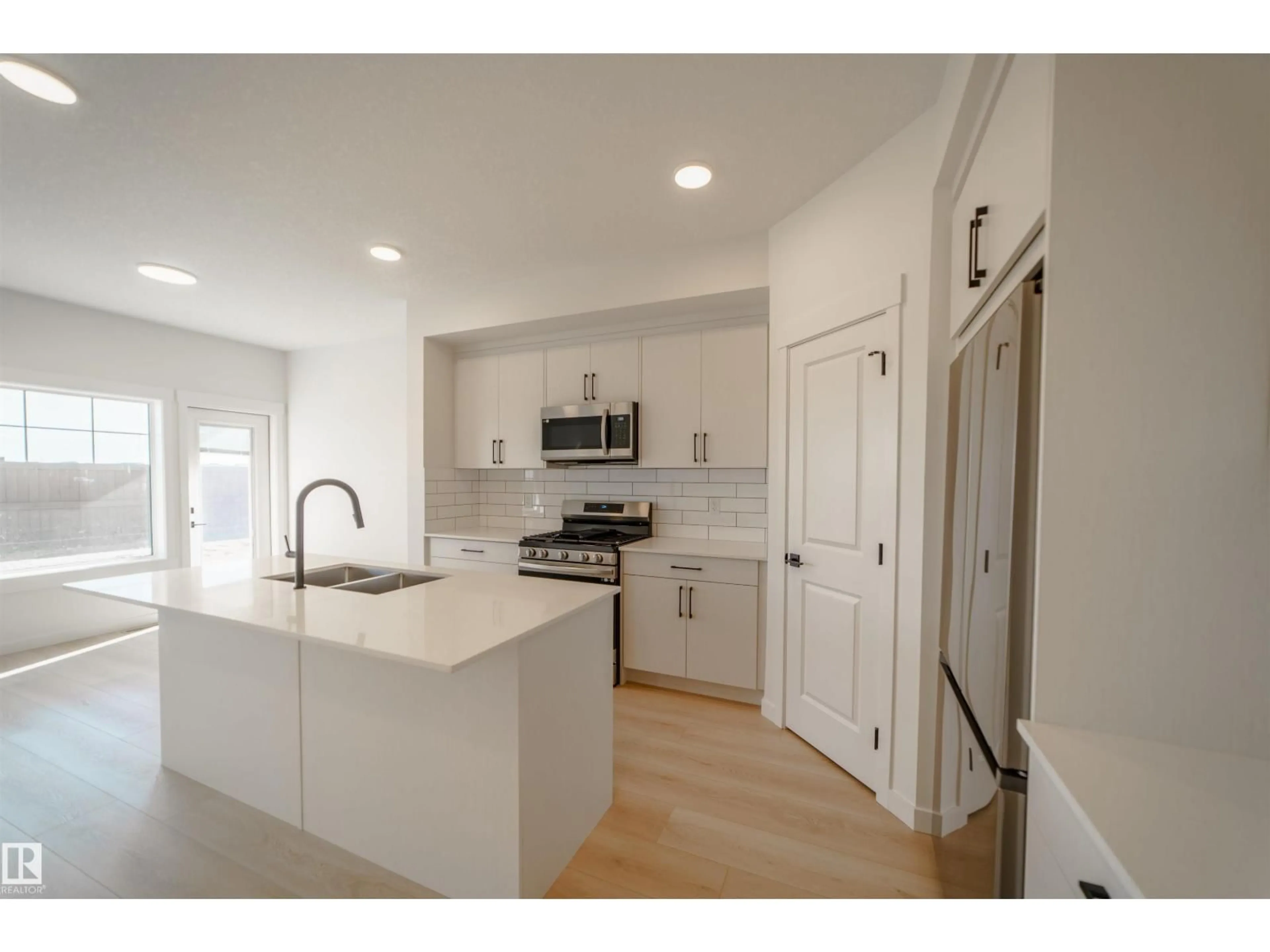 Open concept kitchen, unknown for SW - 1303 PODERSKY WD, Edmonton Alberta T6W5E4