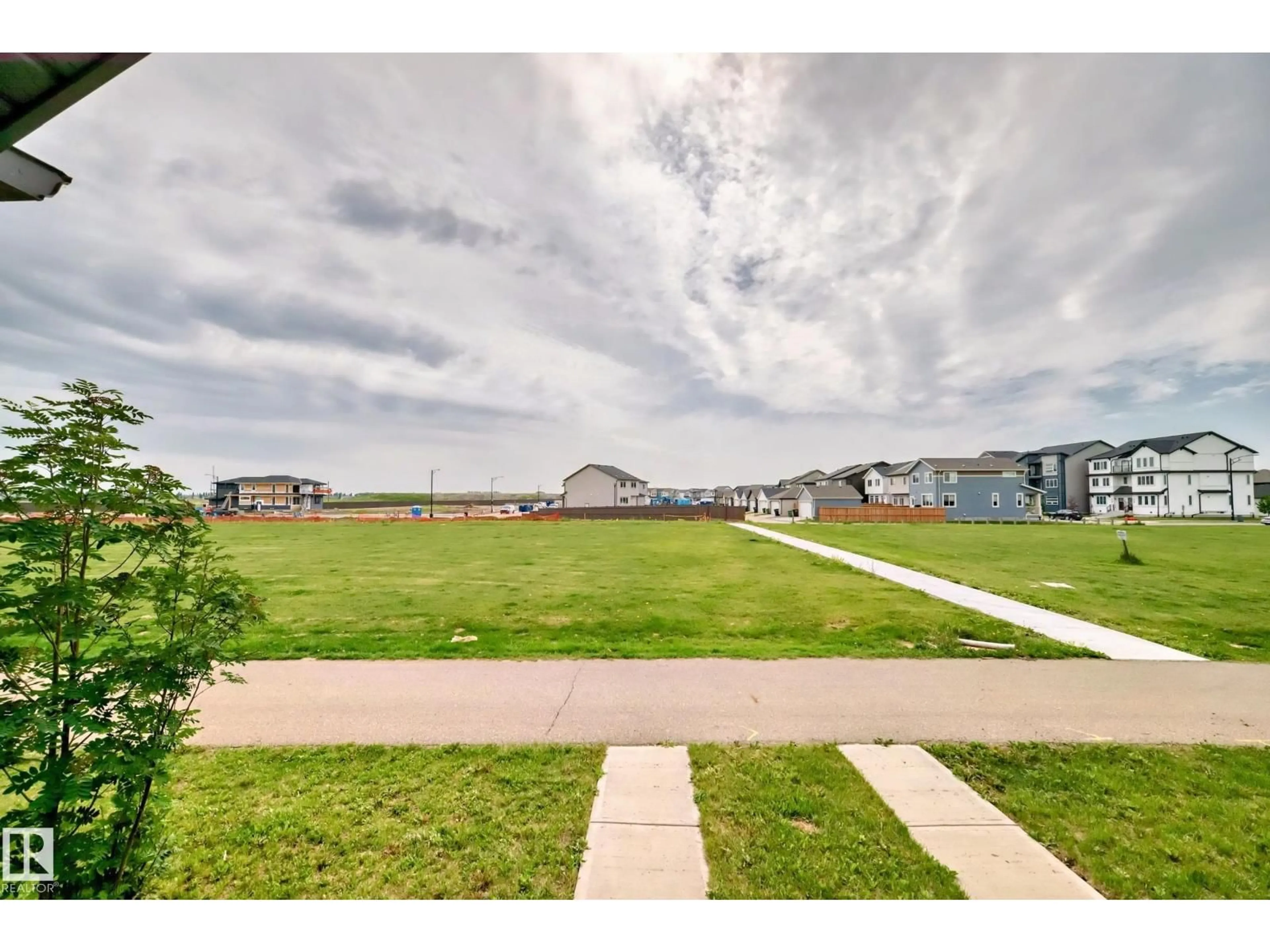 A pic from outside/outdoor area/front of a property/back of a property/a pic from drone, water/lake/river/ocean view for 2271 PRICE LN, Edmonton Alberta T6W3P9