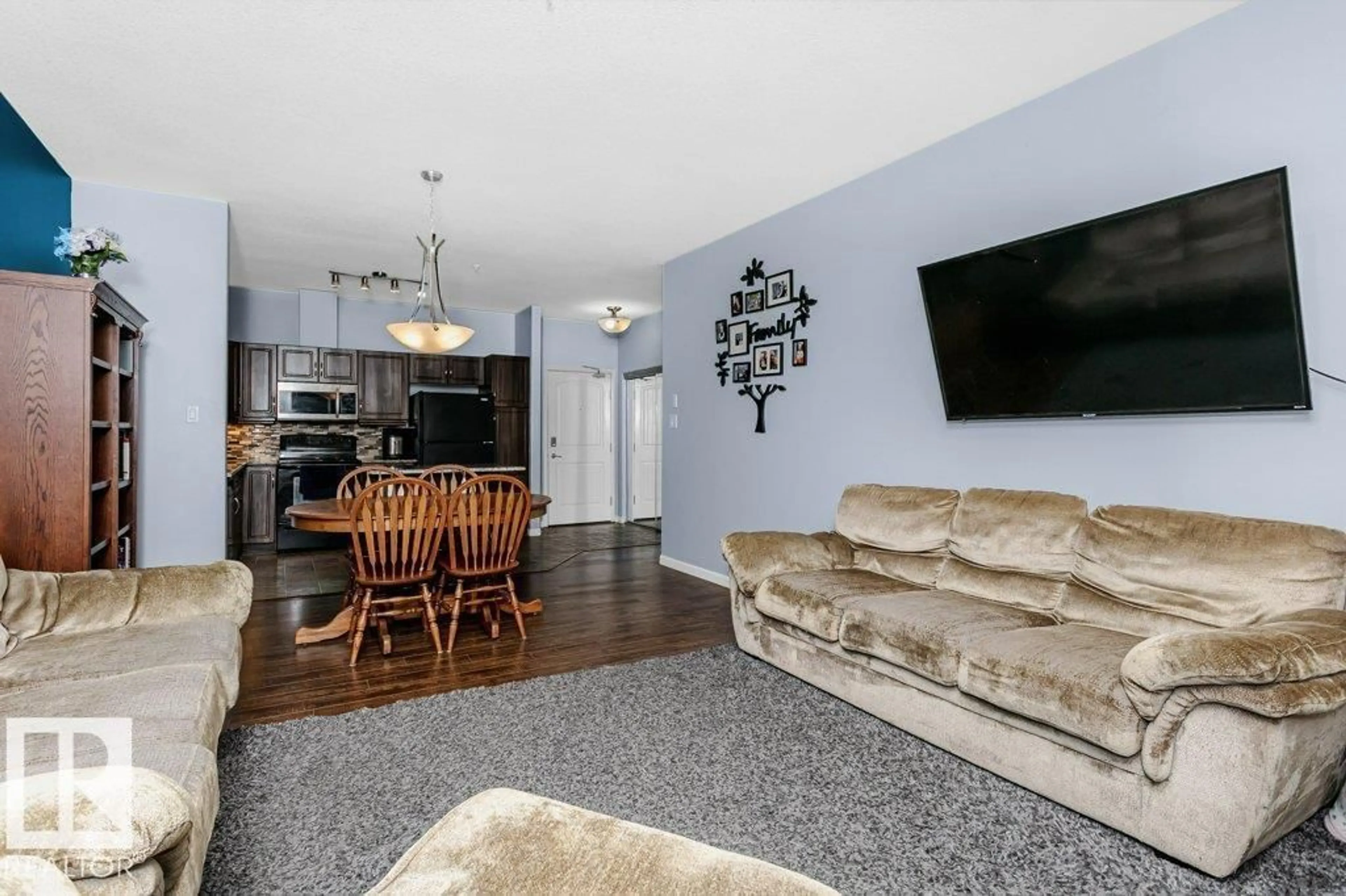Living room with furniture, unknown for #119 - 2503 HANNA CR, Edmonton Alberta T6R0H1