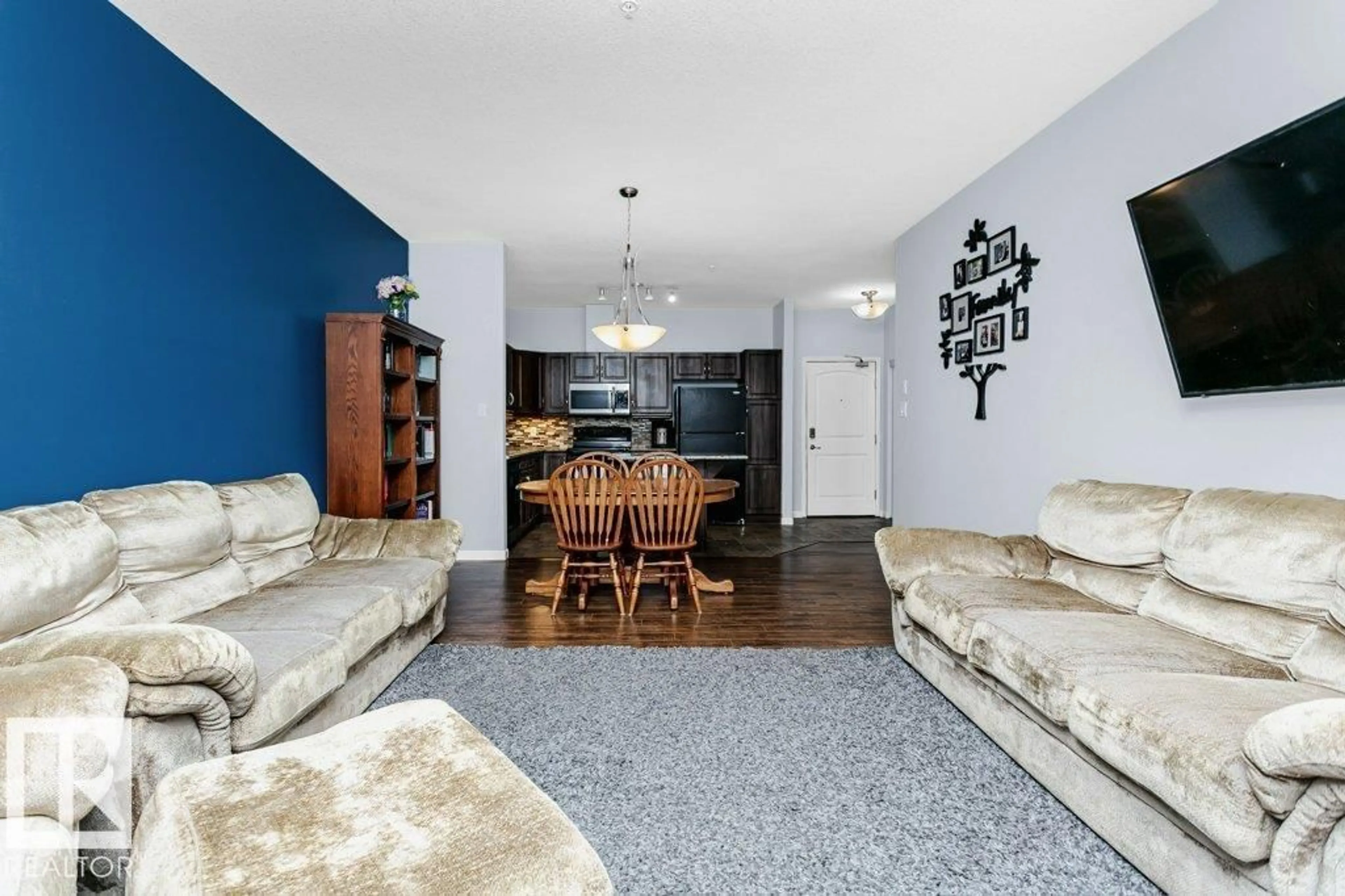 Living room with furniture, unknown for #119 - 2503 HANNA CR, Edmonton Alberta T6R0H1