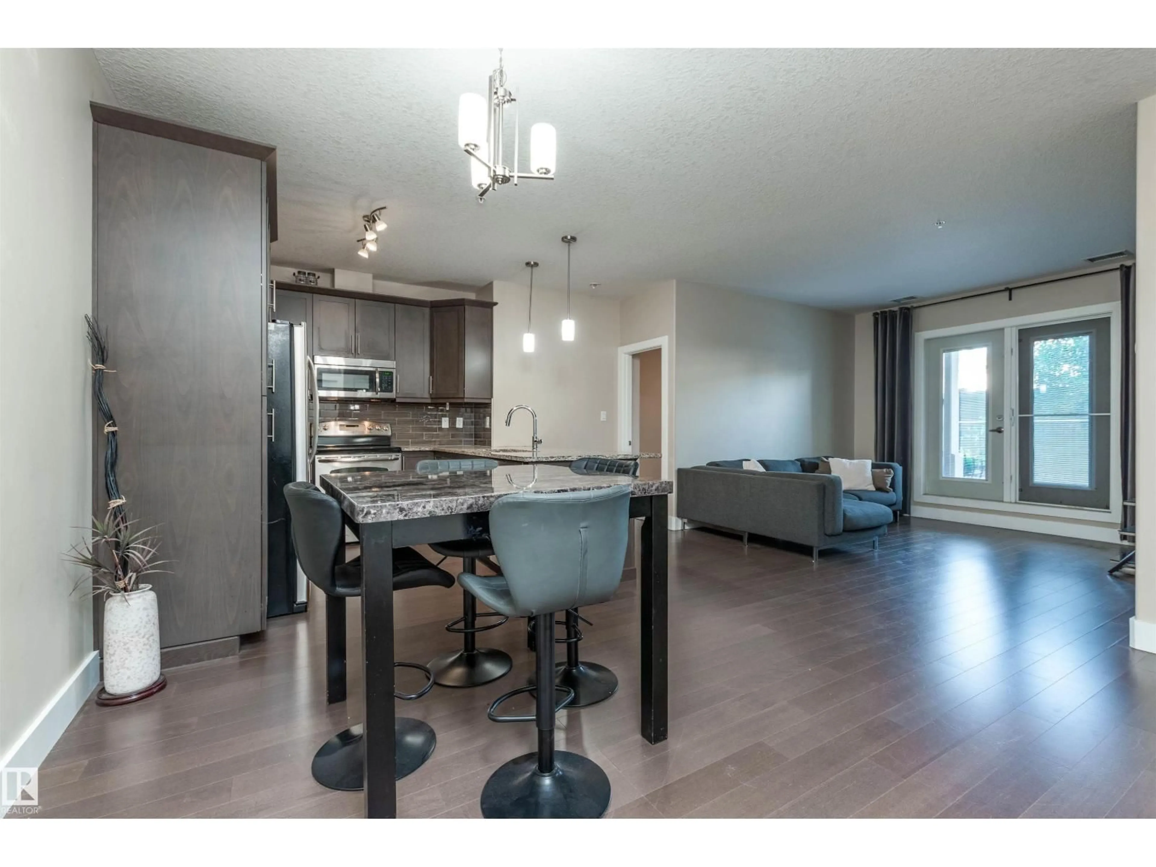 Open concept kitchen, unknown for #140 - 6079 MAYNARD WY, Edmonton Alberta T6R0S4