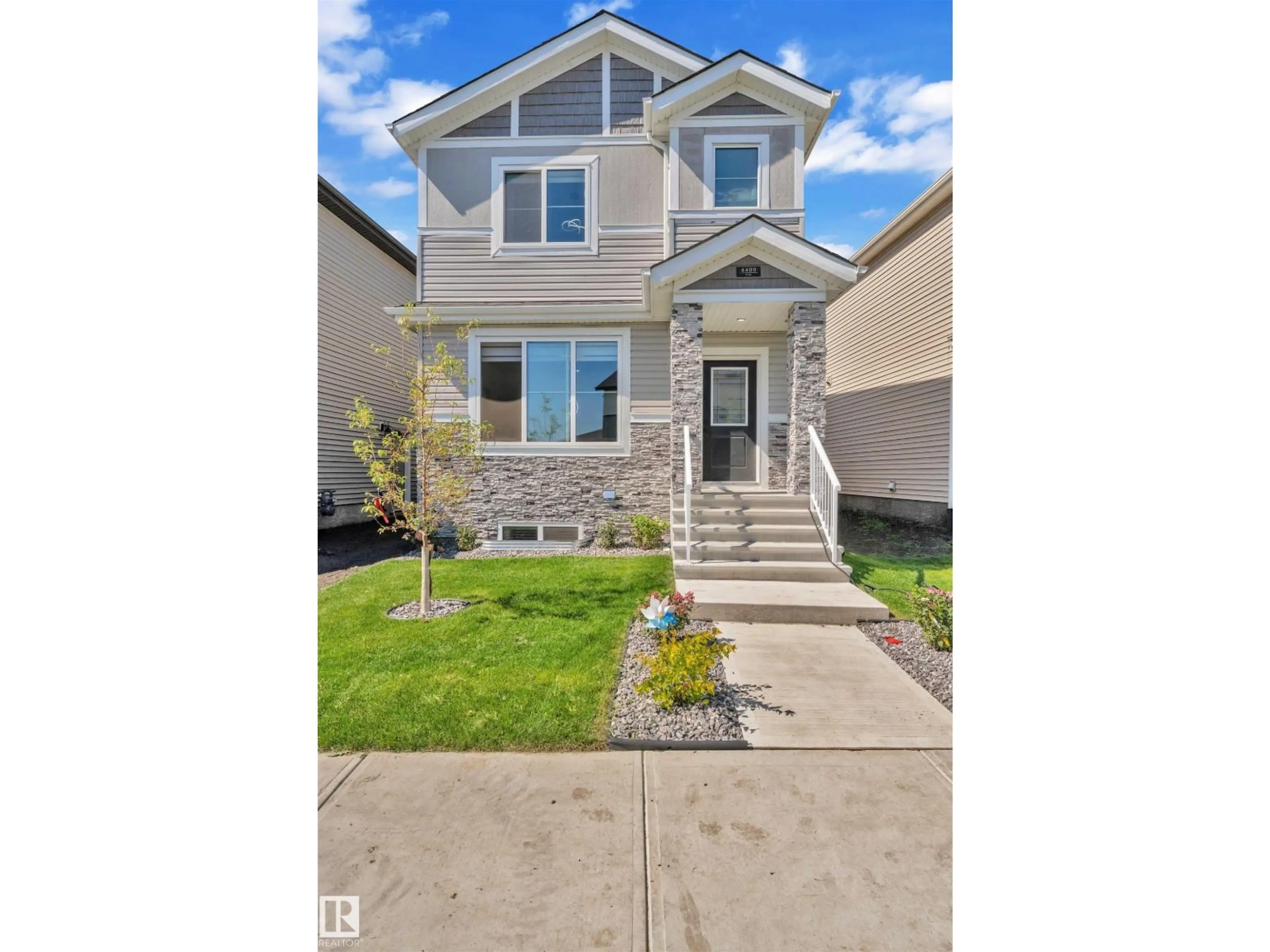Home with vinyl exterior material, street for 4409 37 ST, Beaumont Alberta T4X3A7
