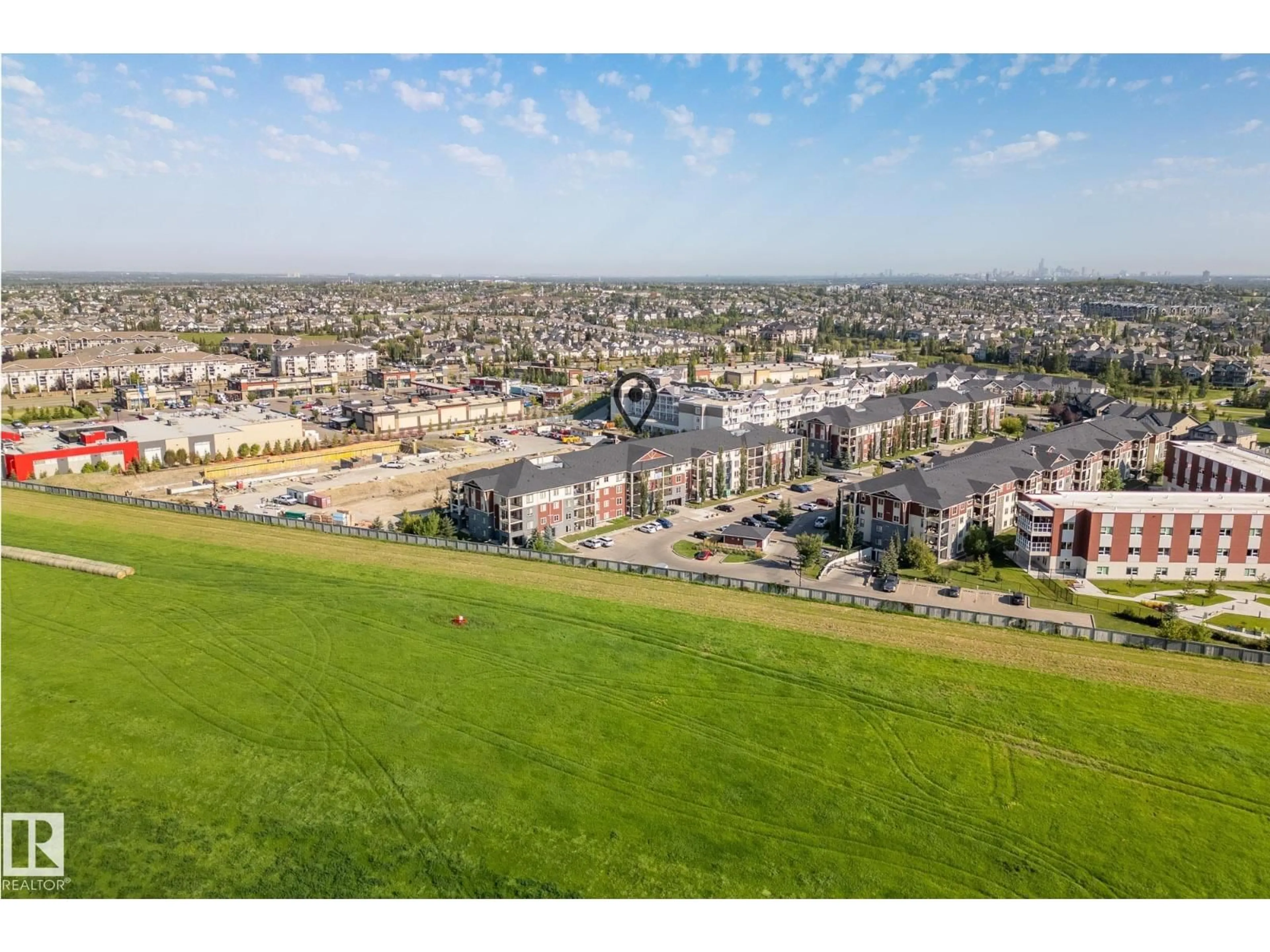 A pic from outside/outdoor area/front of a property/back of a property/a pic from drone, city buildings view from balcony for 204 - 5810 MULLEN PL, Edmonton Alberta T6R0W3