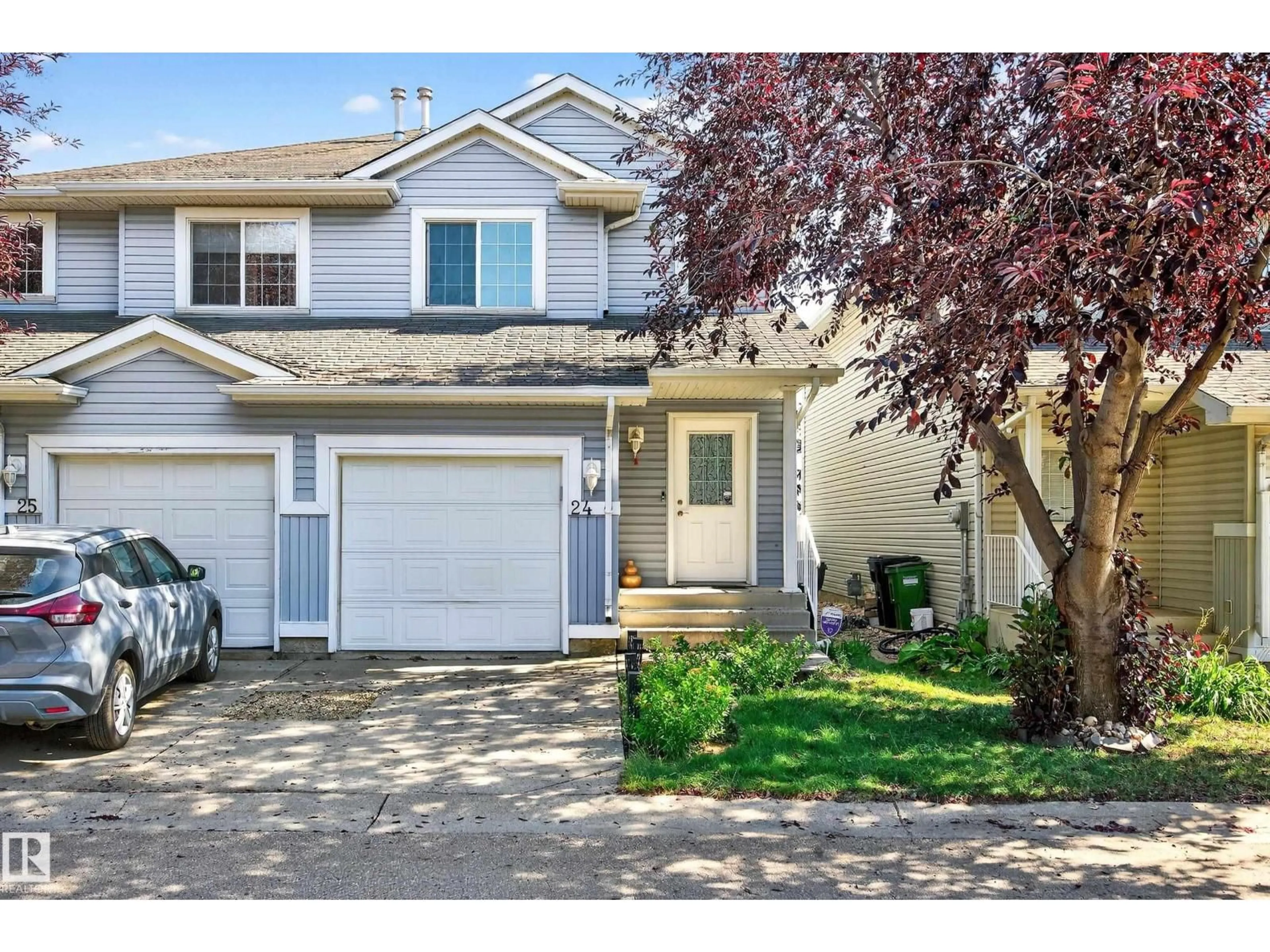 Home with vinyl exterior material, street for 14603 NW - 24 MILLER BV, Edmonton Alberta T5Y3B6