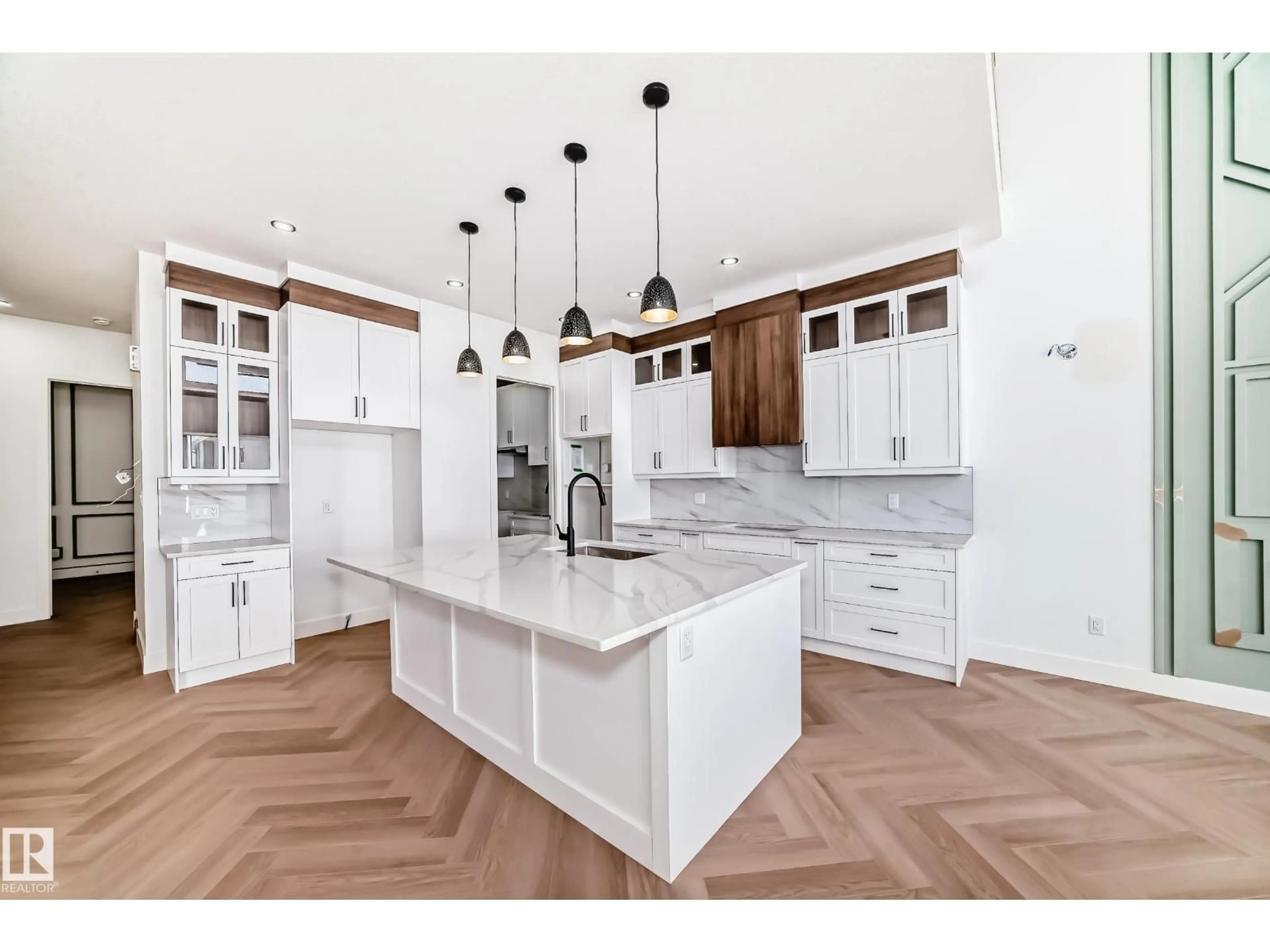 Open concept kitchen, ceramic/tile floor for SW - 7222 KIVIAQ LI, Edmonton Alberta T6W5R3