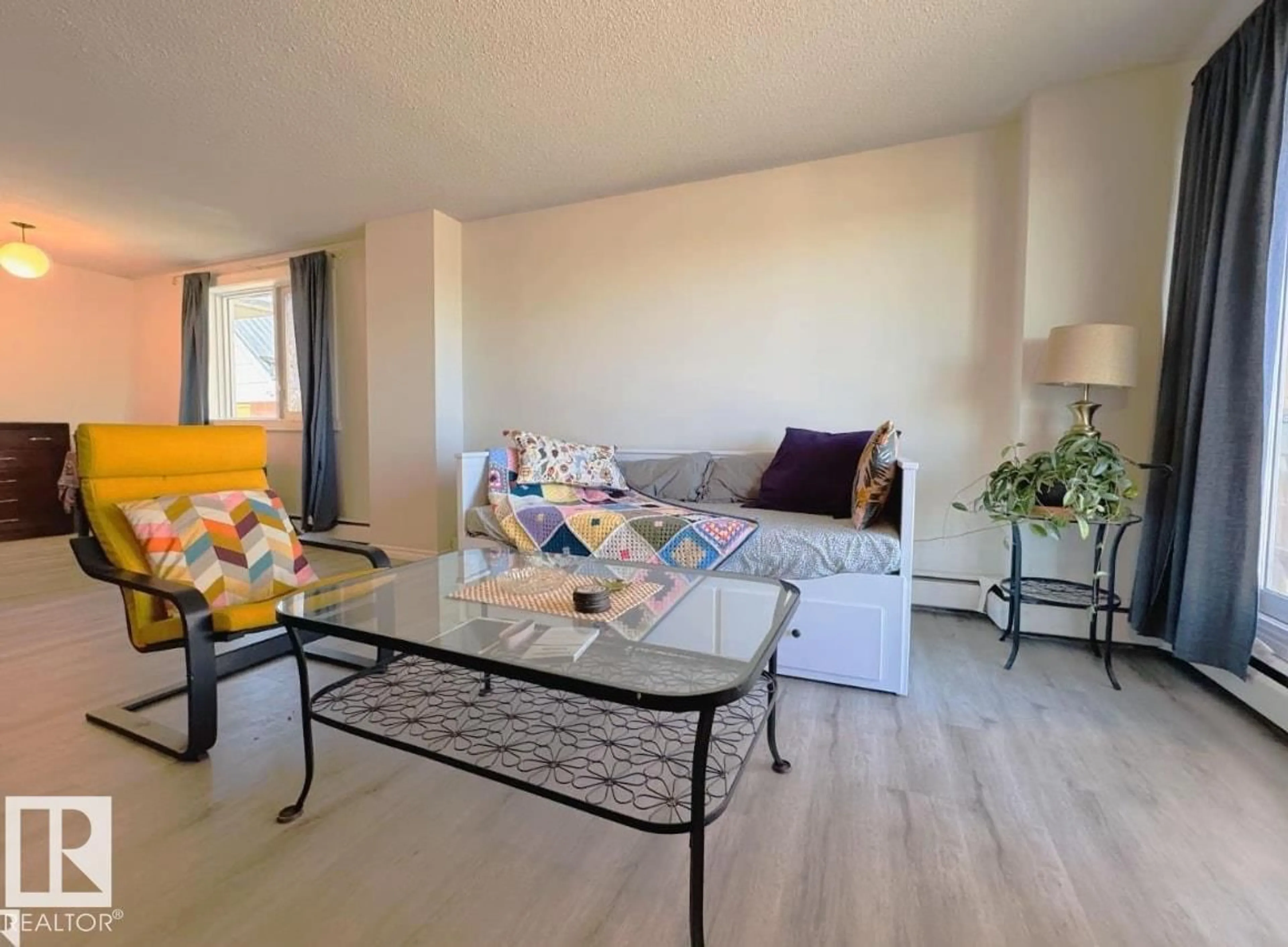 Living room with furniture, unknown for 207 - 9028 JASPER AV, Edmonton Alberta T5H3Y6