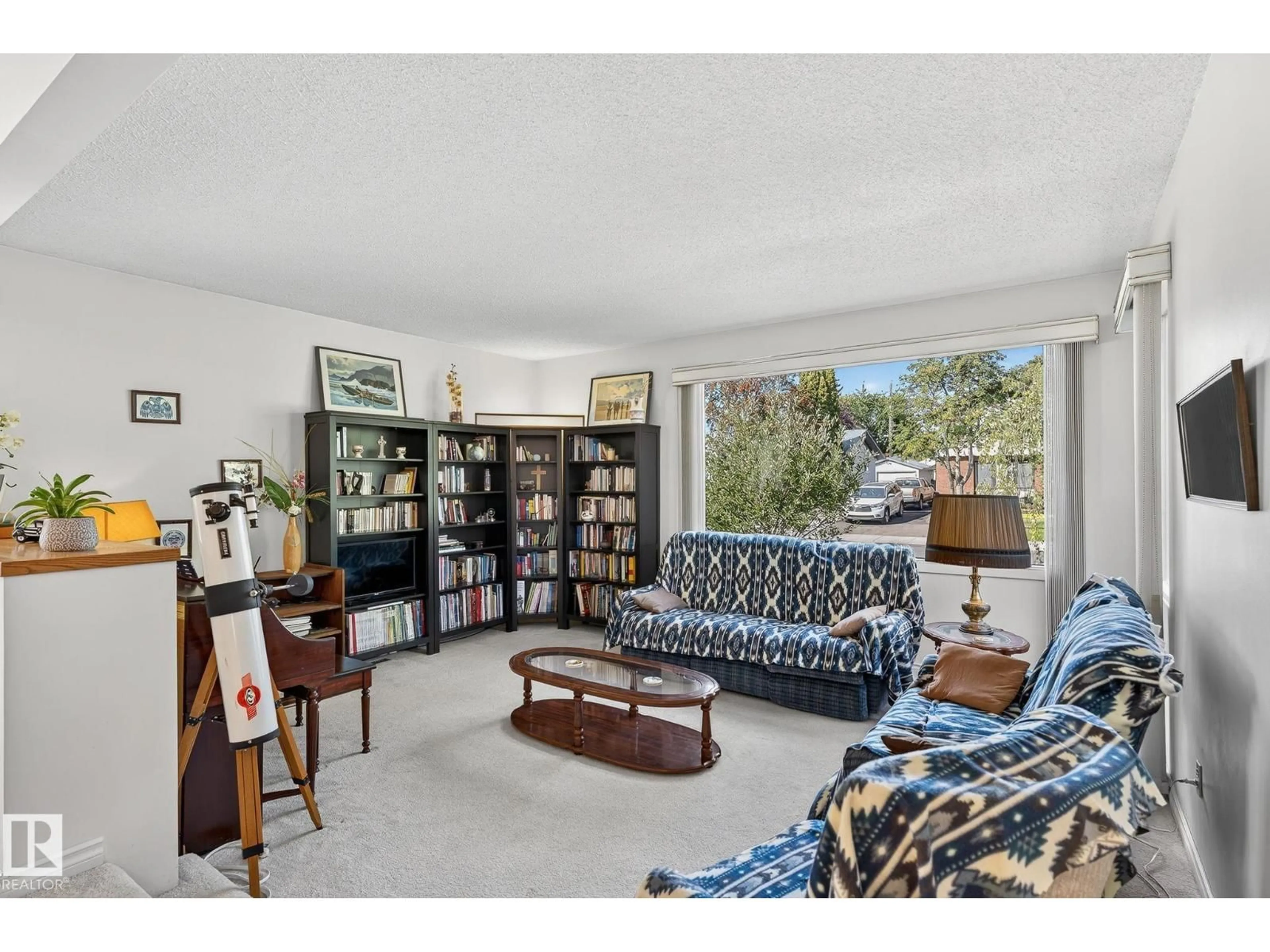 Living room with furniture, unknown for 9319 74 ST, Edmonton Alberta T6B2B5