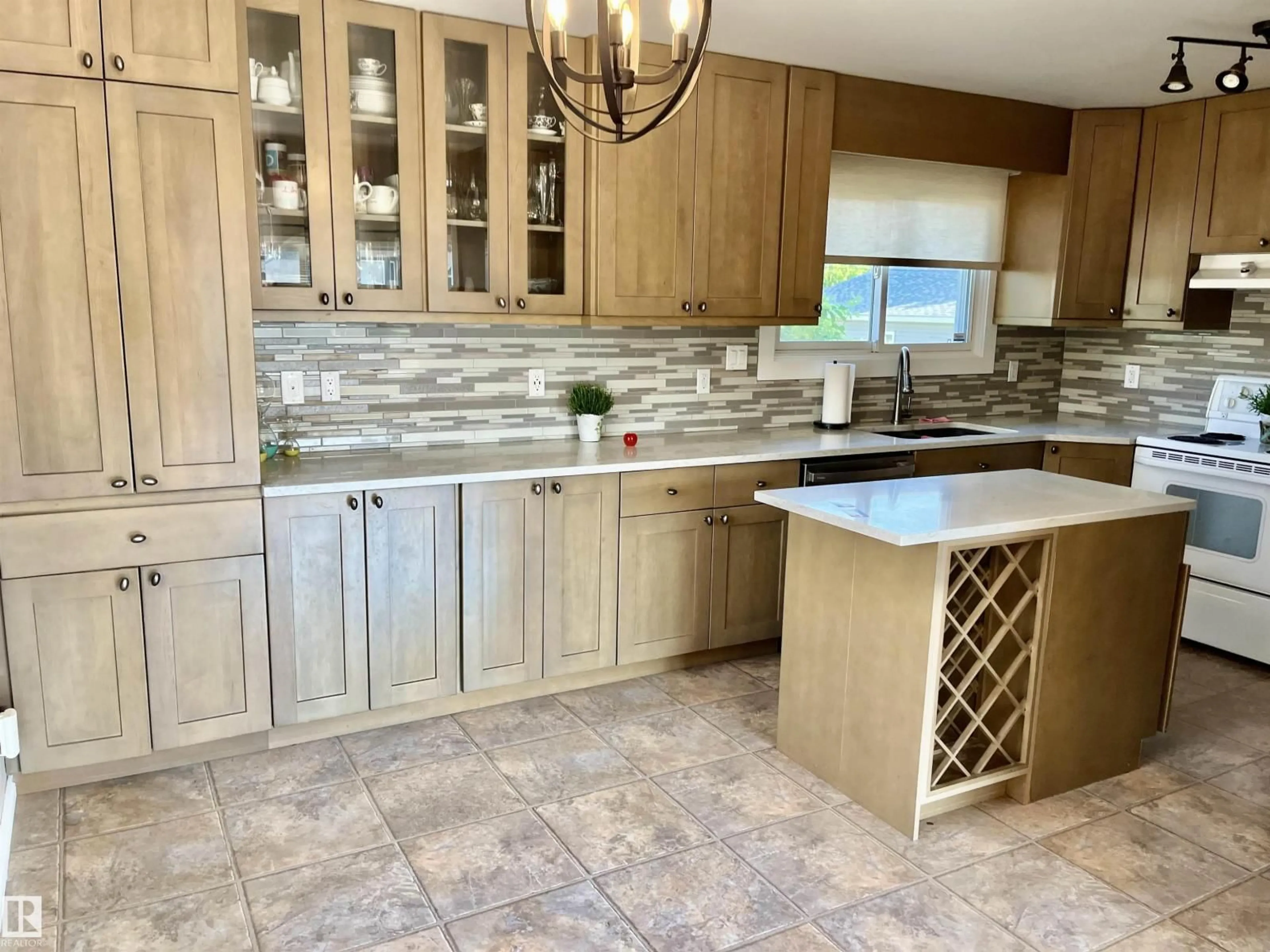 Open concept kitchen, ceramic/tile floor for 4337 48A ST, Vegreville Alberta T9C1B2