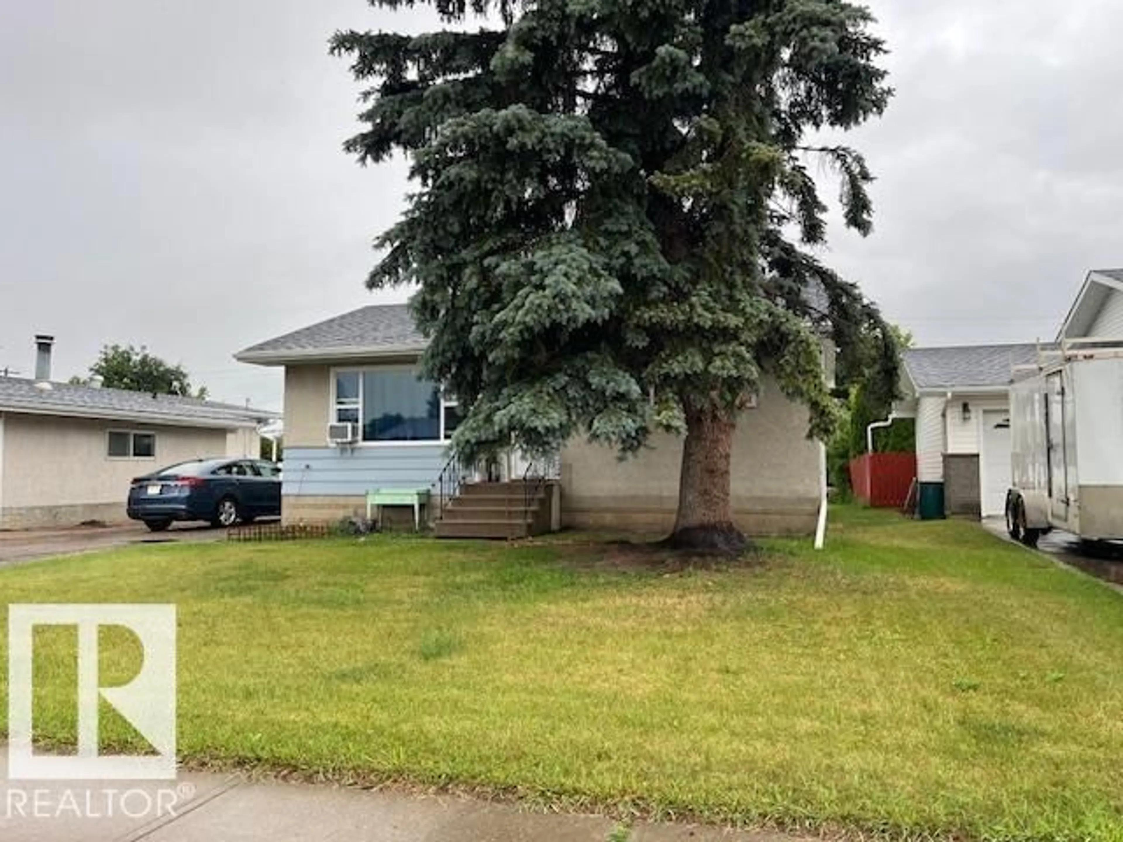 Home with vinyl exterior material, street for 4409 48A ST, Vegreville Alberta T9C1B2