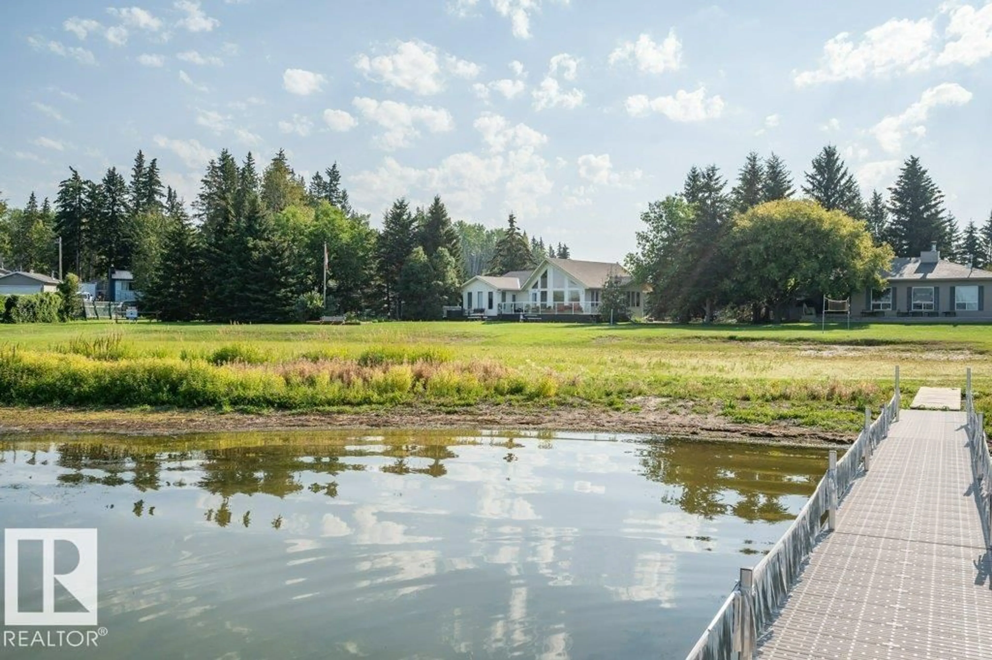 A pic from outside/outdoor area/front of a property/back of a property/a pic from drone, water/lake/river/ocean view for 217 LABONTE DRIVE, Rural Athabasca County Alberta T0A0M0