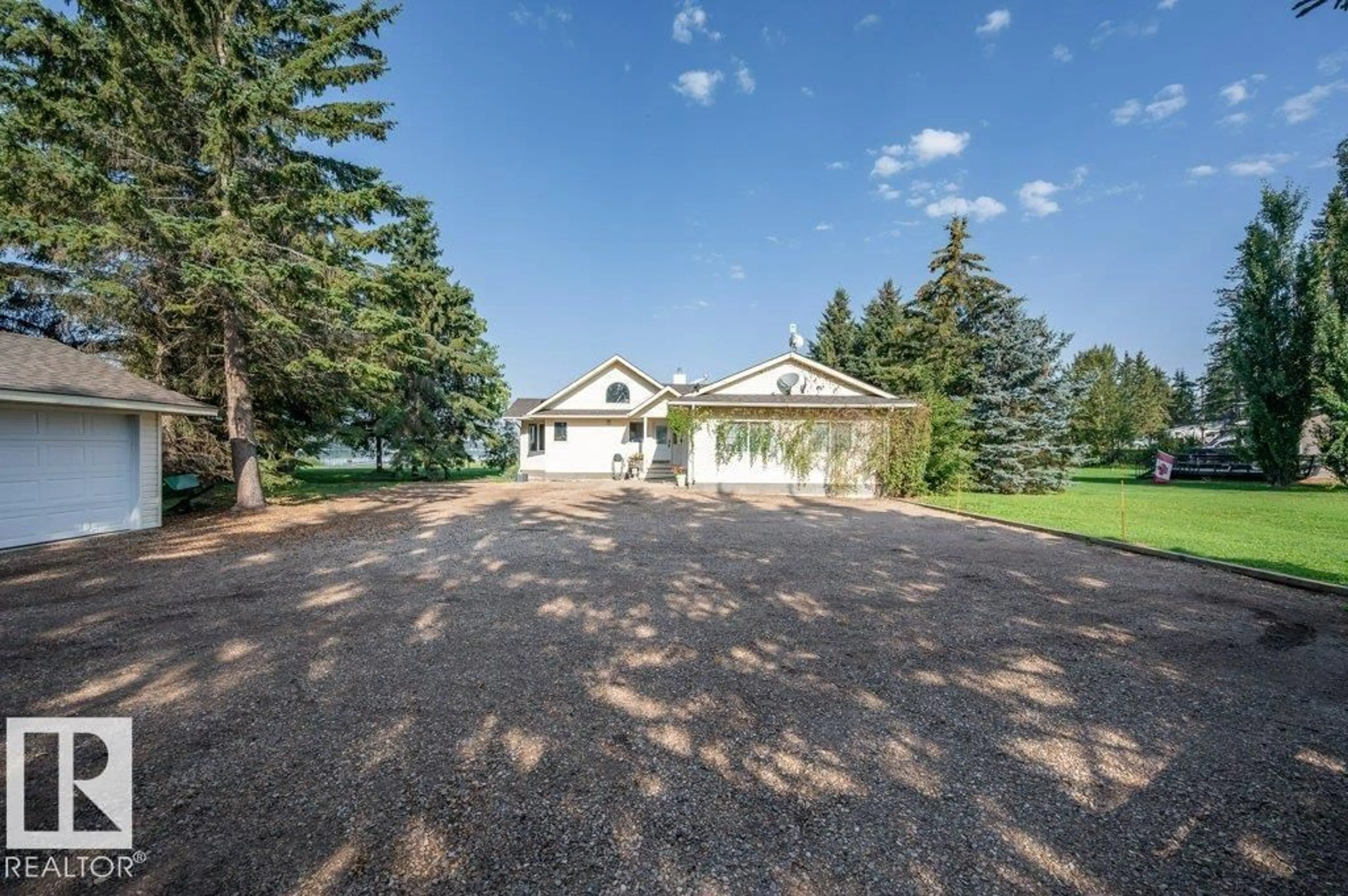 A pic from outside/outdoor area/front of a property/back of a property/a pic from drone, water/lake/river/ocean view for 217 LABONTE DRIVE, Rural Athabasca County Alberta T0A0M0