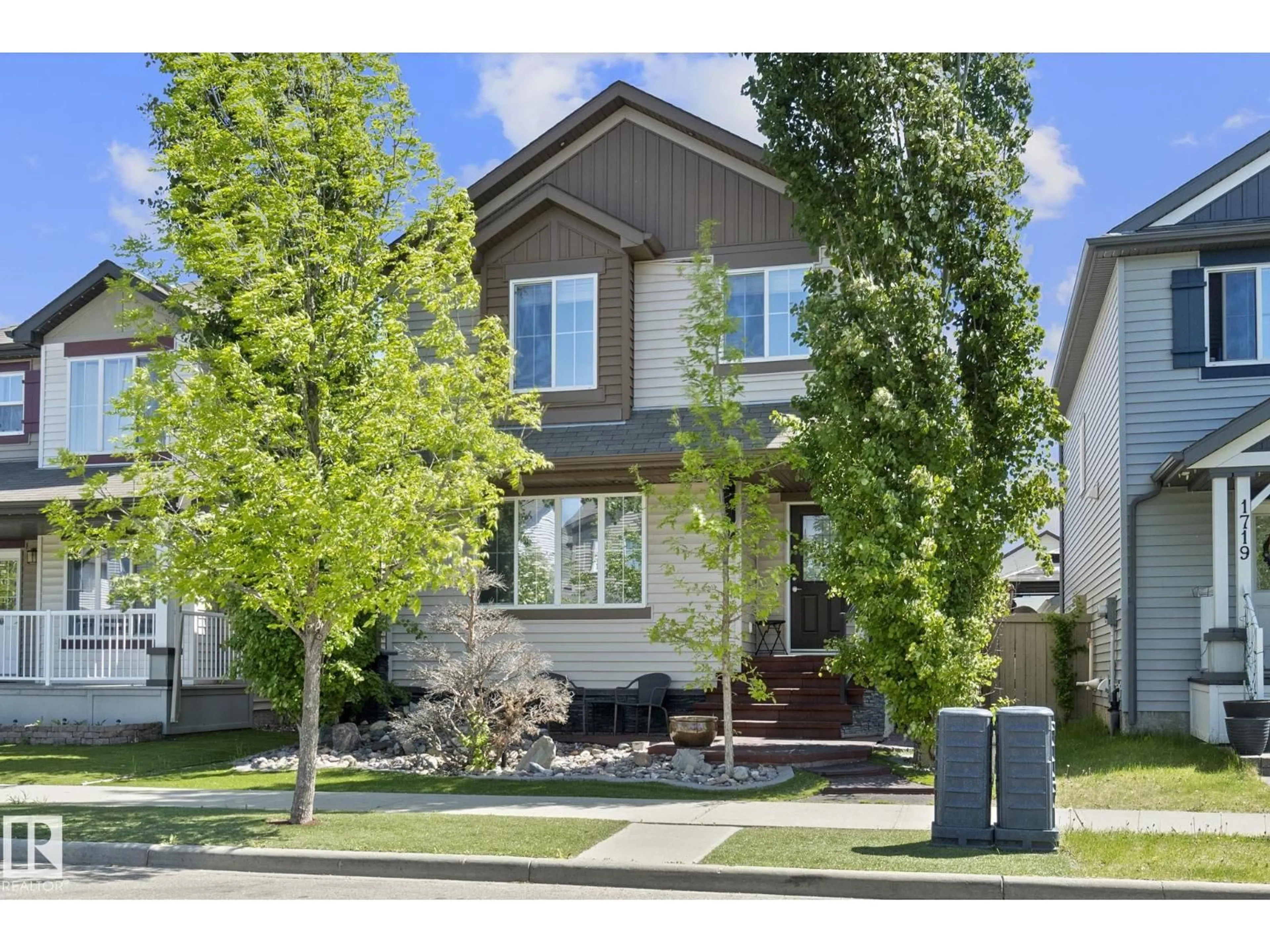 Home with vinyl exterior material, street for SW - 1715 63 ST, Edmonton Alberta T6X0S2