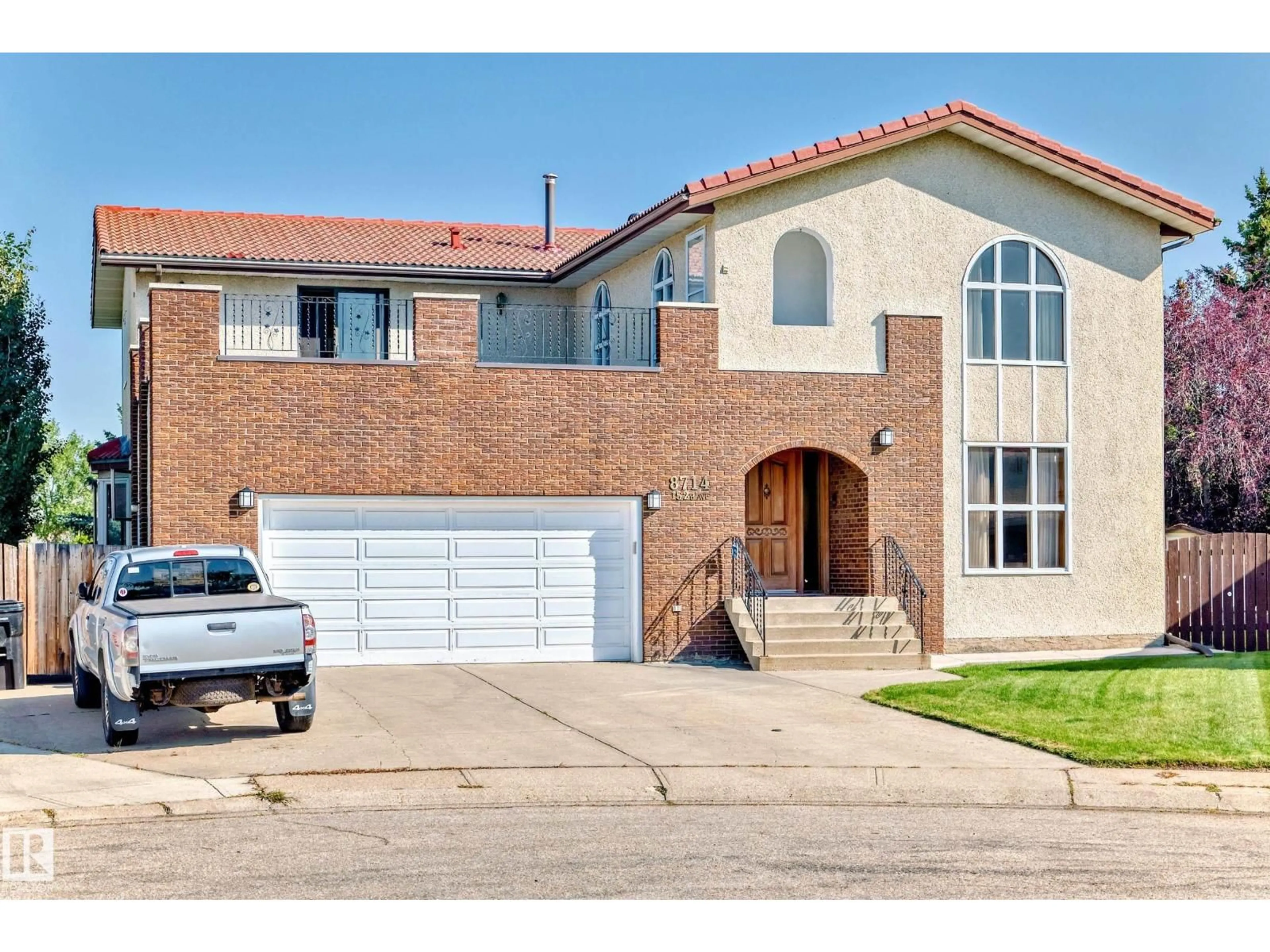 Home with brick exterior material, street for NW - 8714 152B AV, Edmonton Alberta T5E6H2
