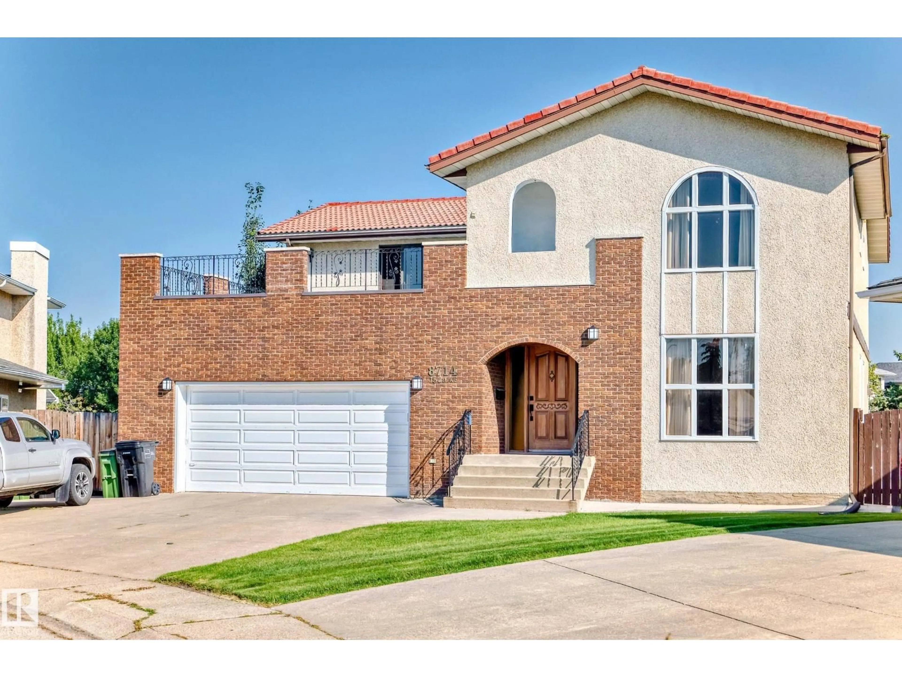 Home with brick exterior material, street for NW - 8714 152B AV, Edmonton Alberta T5E6H2