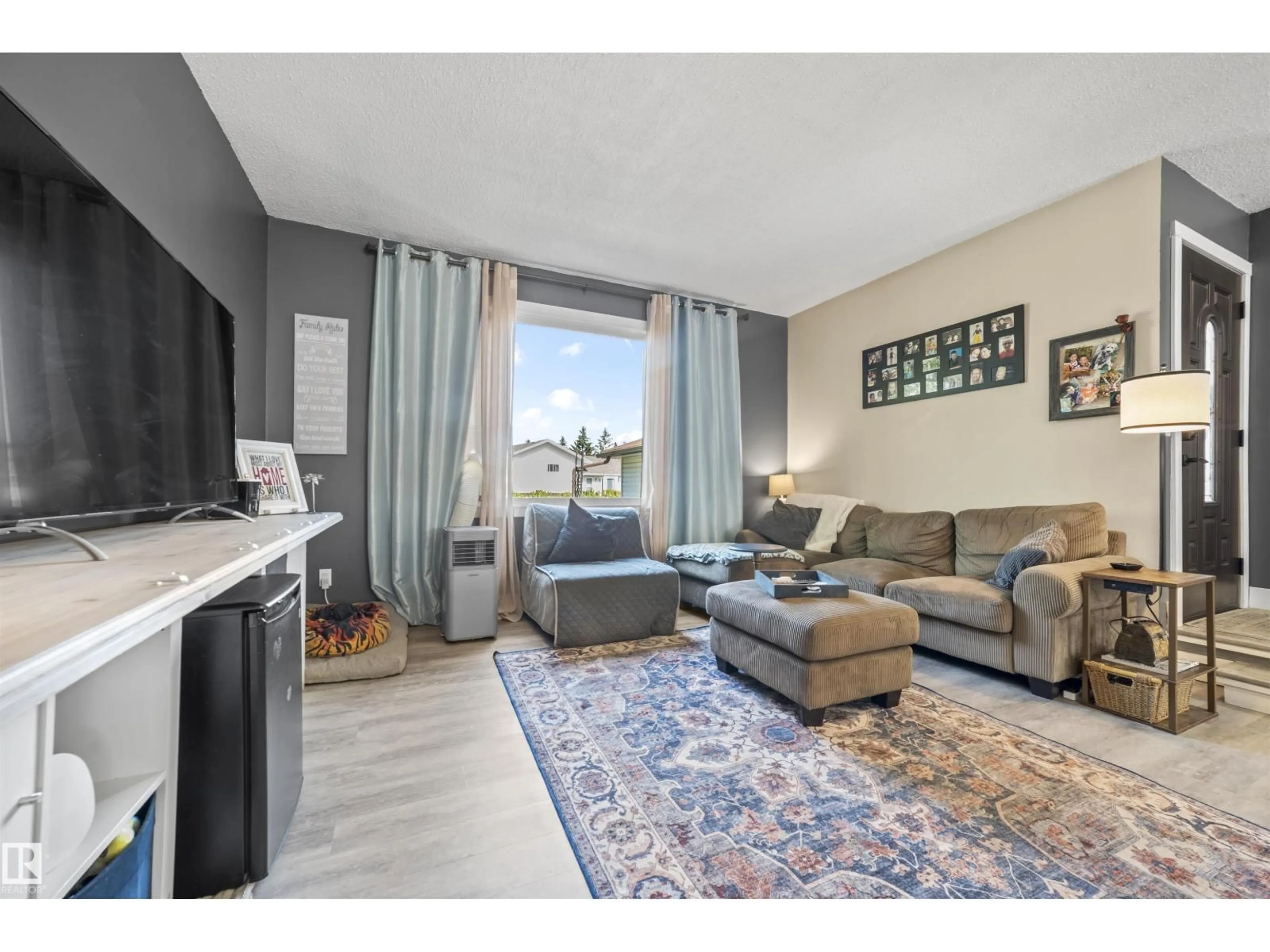Living room with furniture, unknown for 4611 16A AV, Edmonton Alberta T6L2S3