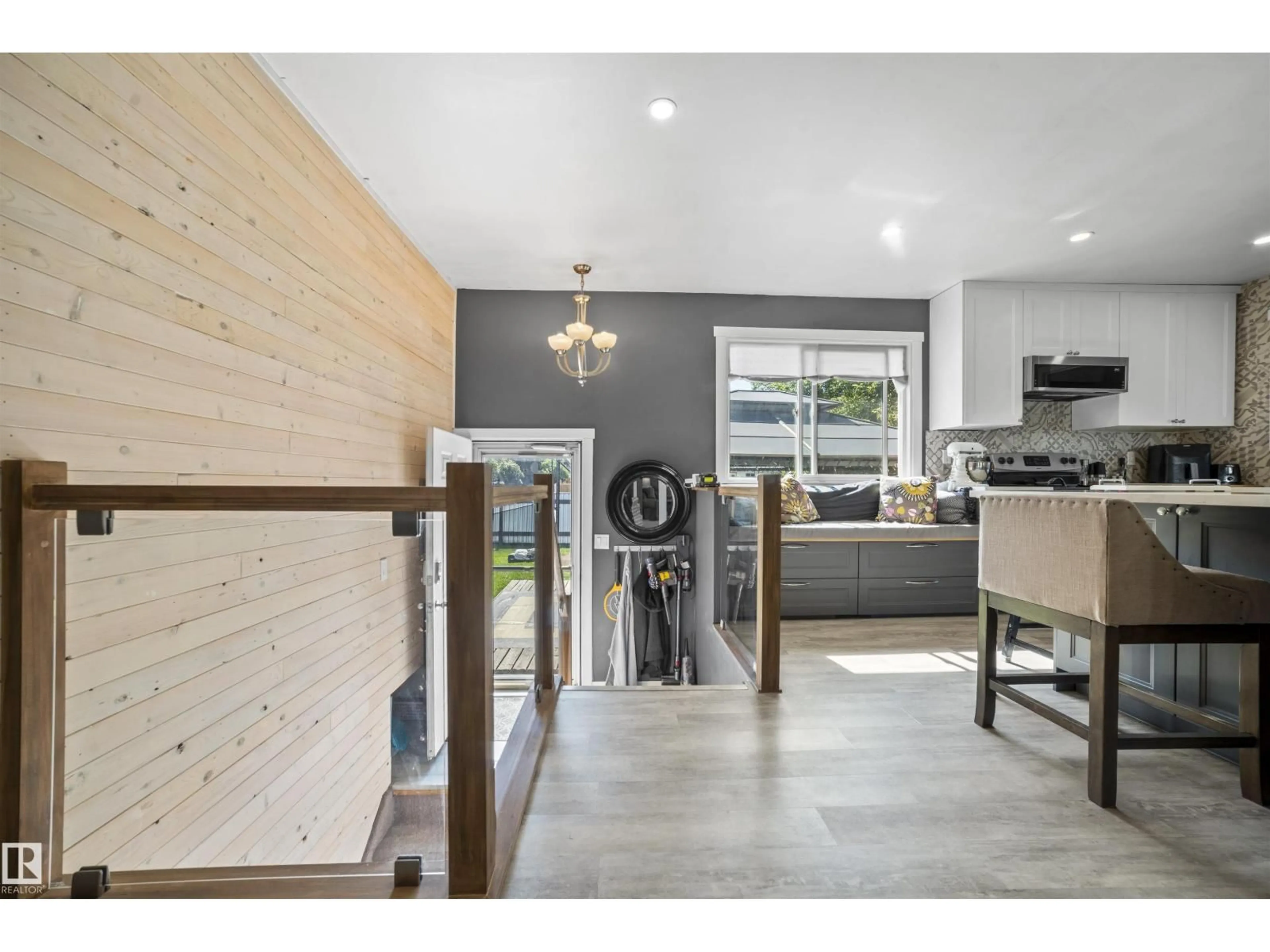 Open concept kitchen, wood/laminate floor for 4611 16A AV, Edmonton Alberta T6L2S3