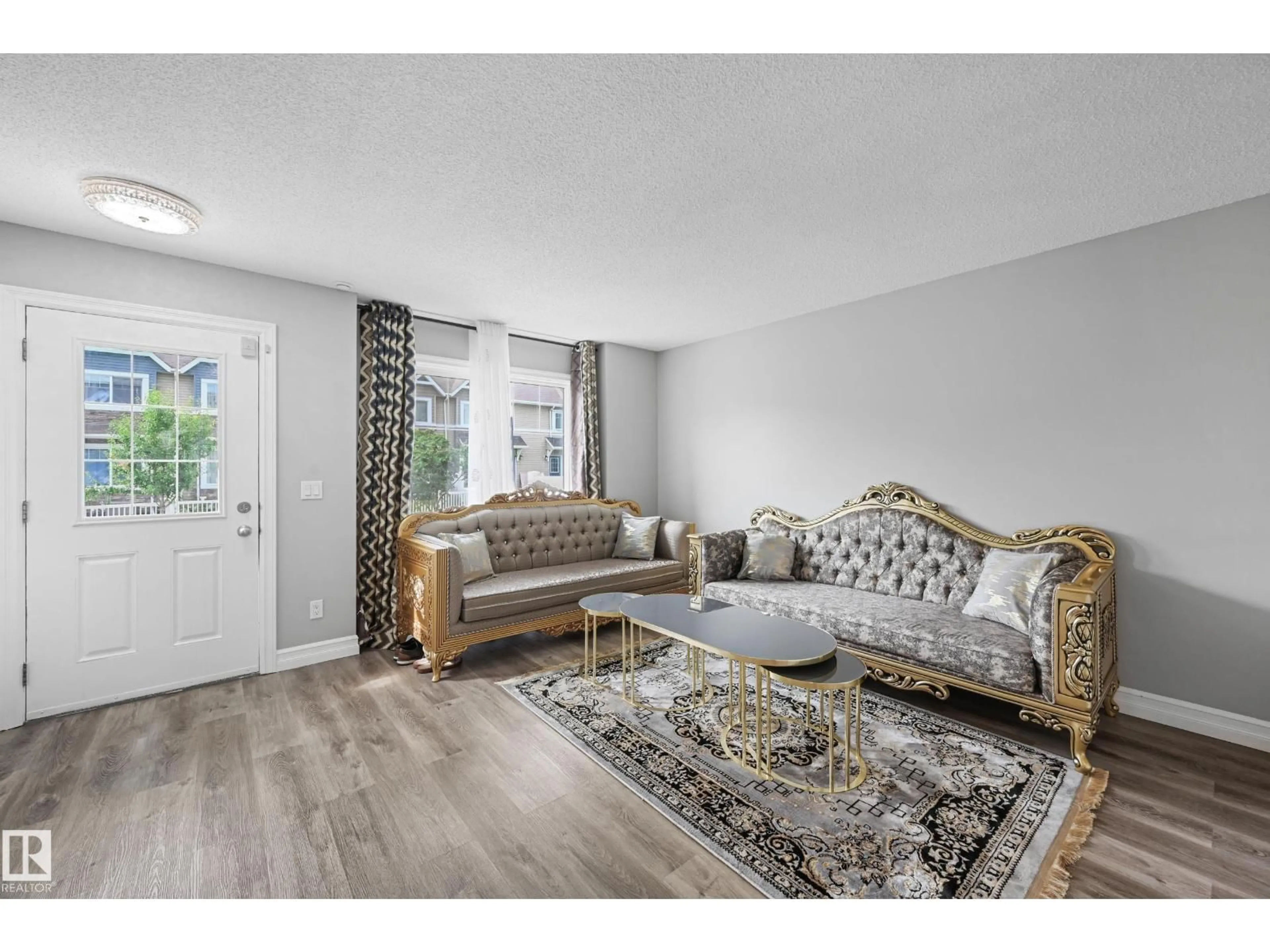 Living room with furniture, unknown for 52 14621 121 ST NW, Edmonton Alberta T5X0H2
