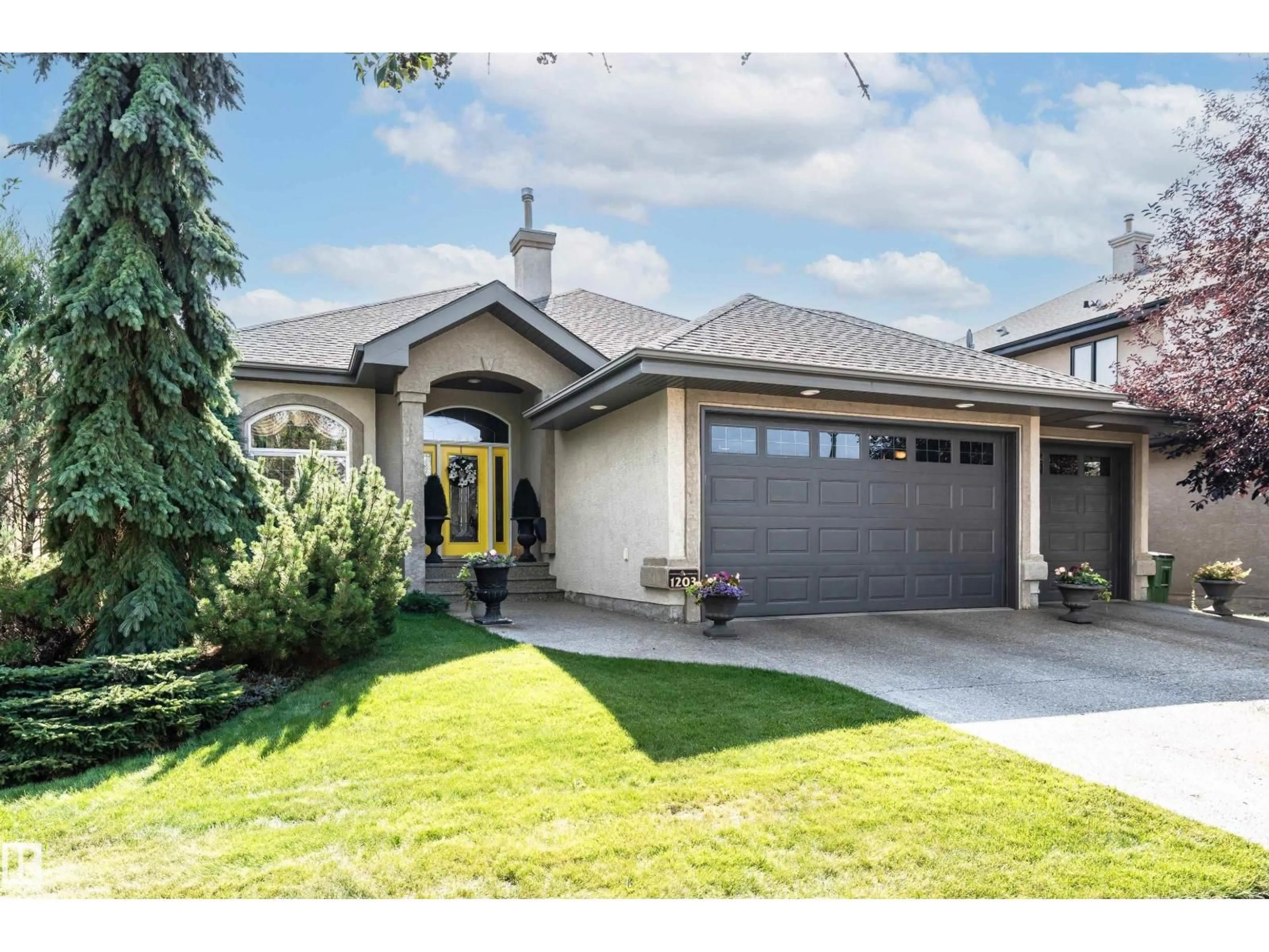 Home with vinyl exterior material, street for 1203 HOLLANDS CL, Edmonton Alberta T6R3L2