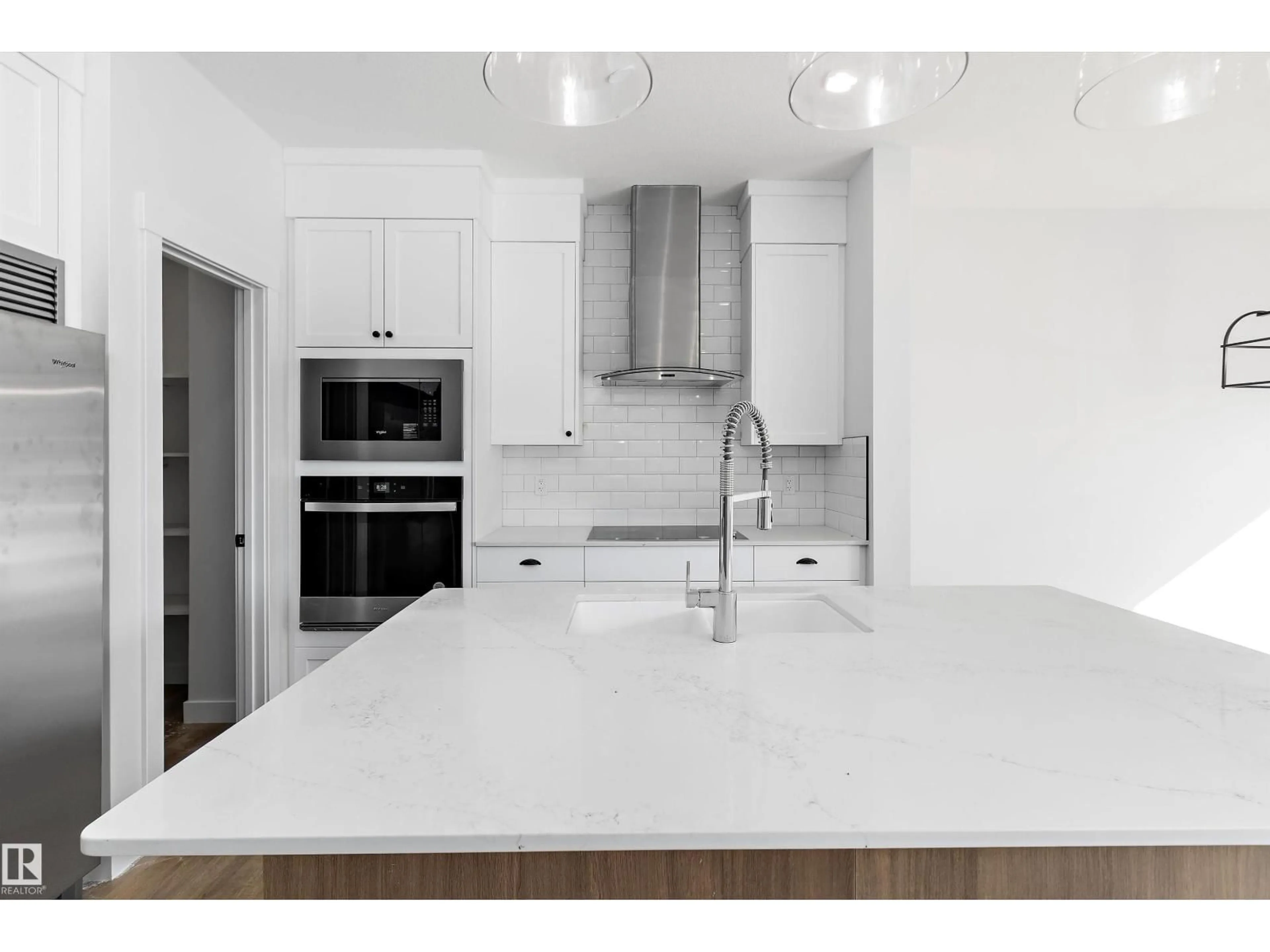 Open concept kitchen, ceramic/tile floor for 4511 WARBLER LOOP, Edmonton Alberta T5S2C2
