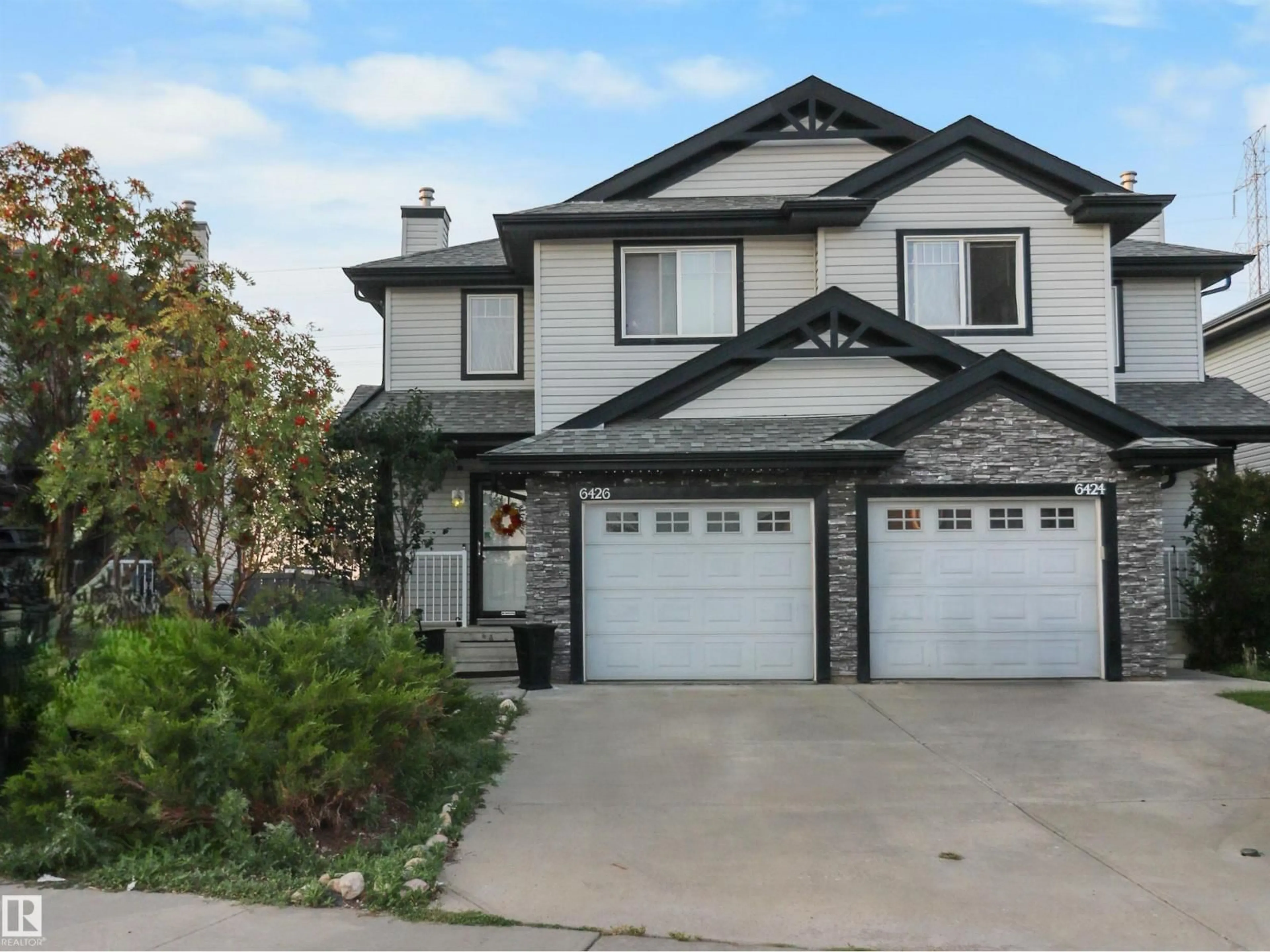 Home with vinyl exterior material, street for SW - 6426 1A AV, Edmonton Alberta T6X0B5